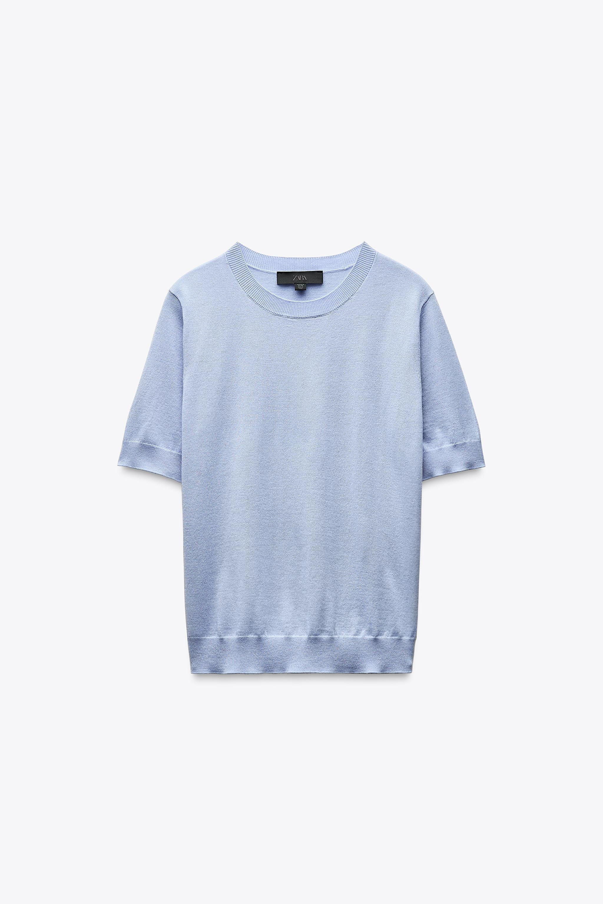 Fine knit top made with wool. Round neck and short sleeves. | Zara US