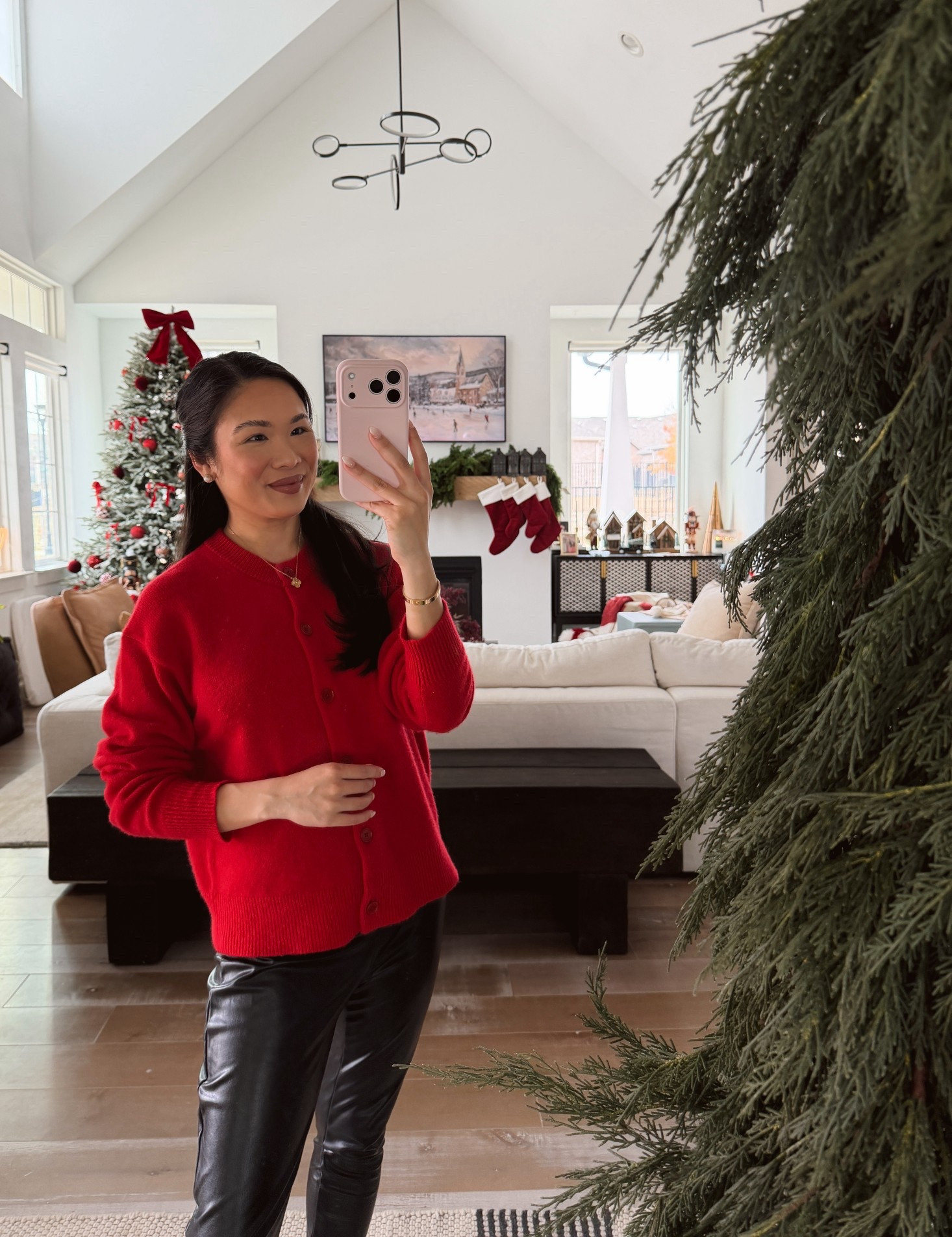 Casual holiday outfit with a relaxed cashmere cardigan and faux leather leggings that are postpartum friendly. Also linking the cypress garland on our oversized floor mirror in our entryway and cedar garland on our mantle. 

#LTKHoliday #LTKPetite