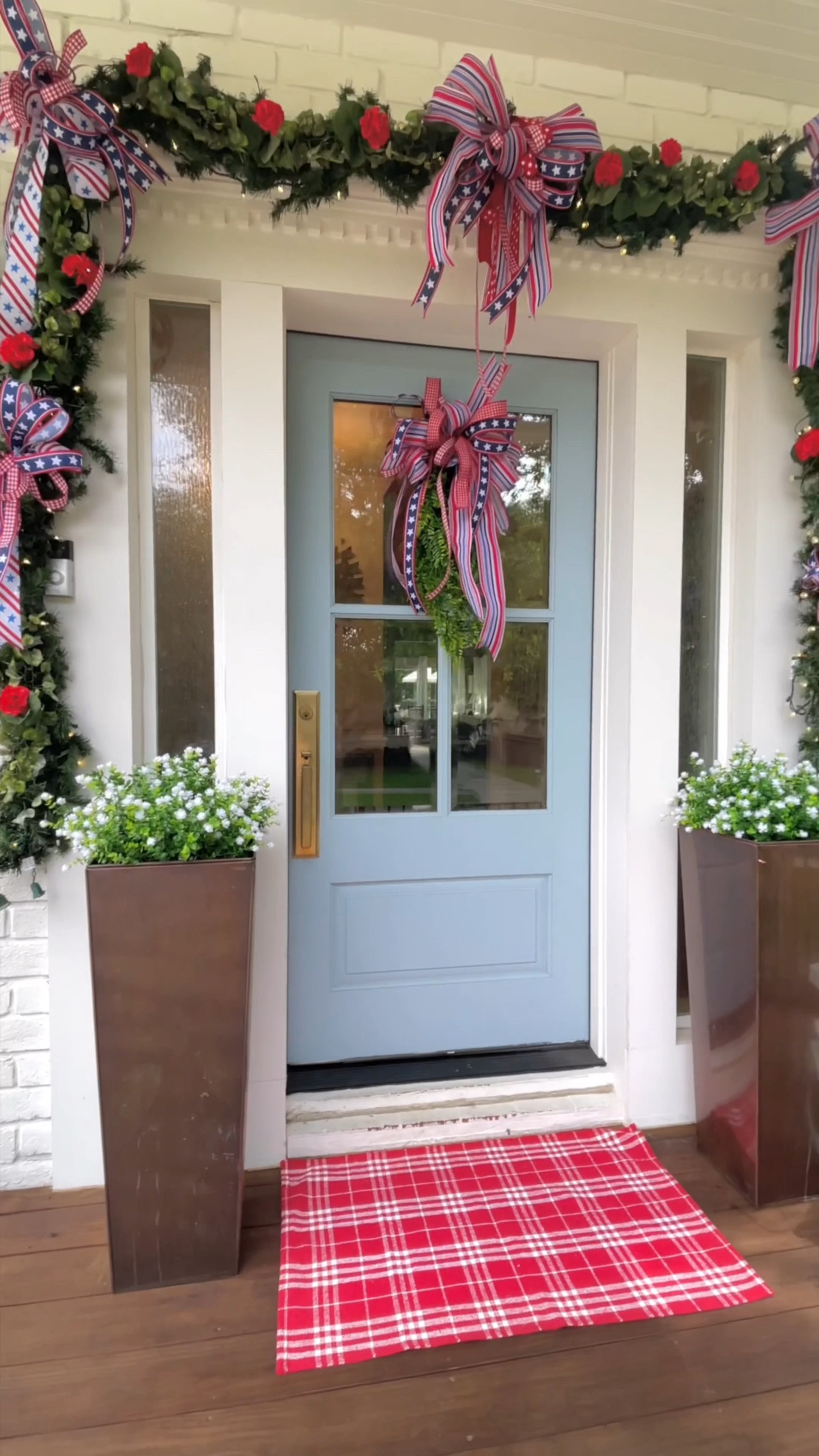 Patriotic/ Fourth of July front porch decor - I used a Christmas garland and just added ivy garland on top and then used red geraniums sprays to fill it in - of course made large bows to complete the look. 😀
Sources from - Amazon, Michaels and Frontgate 

#LTKFindsUnder50 #LTKSeasonal #LTKHome