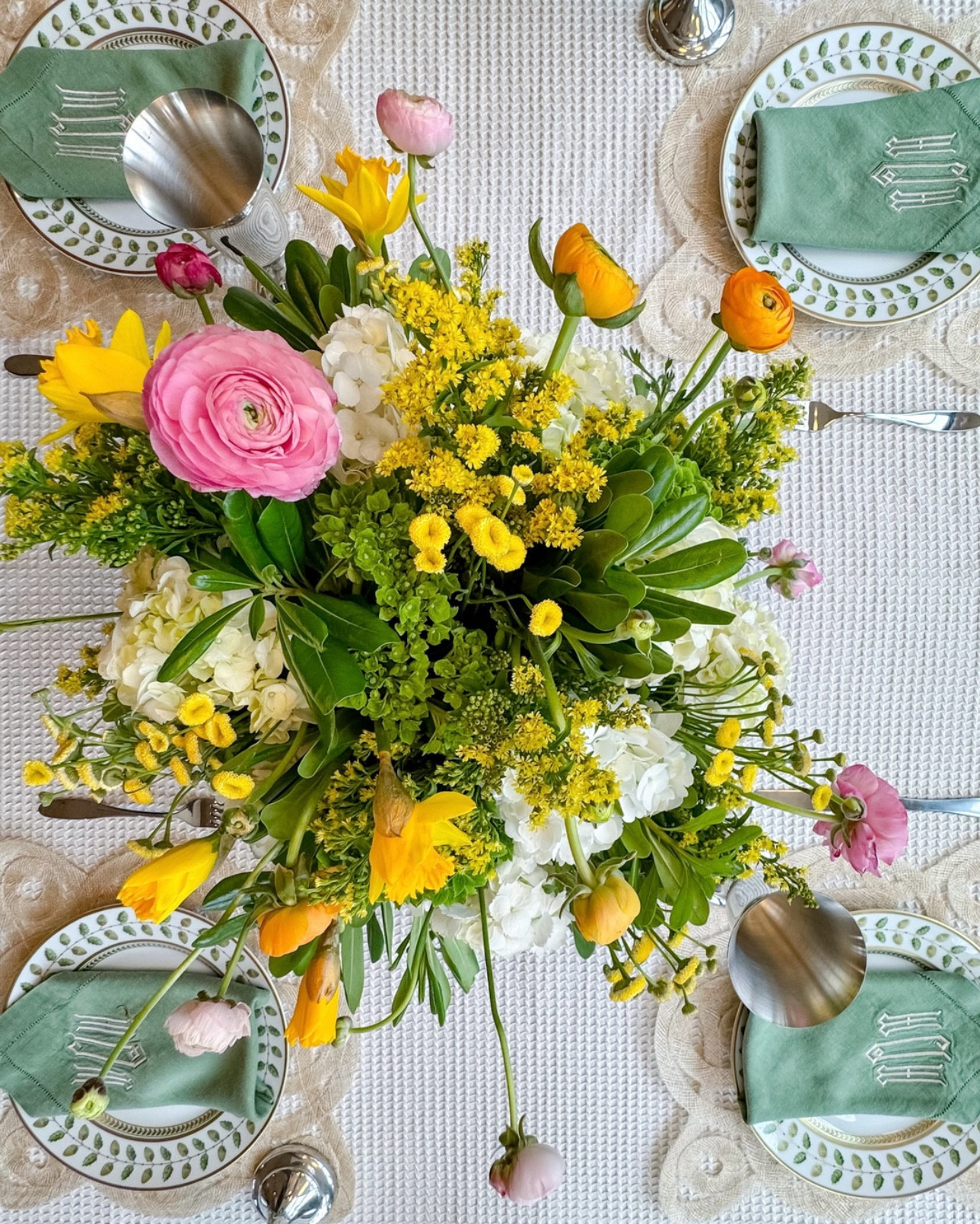 Meg always creates a beautiful flower arrangement for the lunch table when hosting mahjong day. We love her advice on putting together something simple for your own table. 🌸

“Watch a few YouTube videos and don’t overthink it. I love walking around my yard, finding things I can put in a vase, like winter jasmine or branches. Just like with painting, you can’t go wrong with mixing pastels. And green works like a neutral. Everything goes with green. Start there.”

#LTKHome #LTKSeasonal #LTKParties