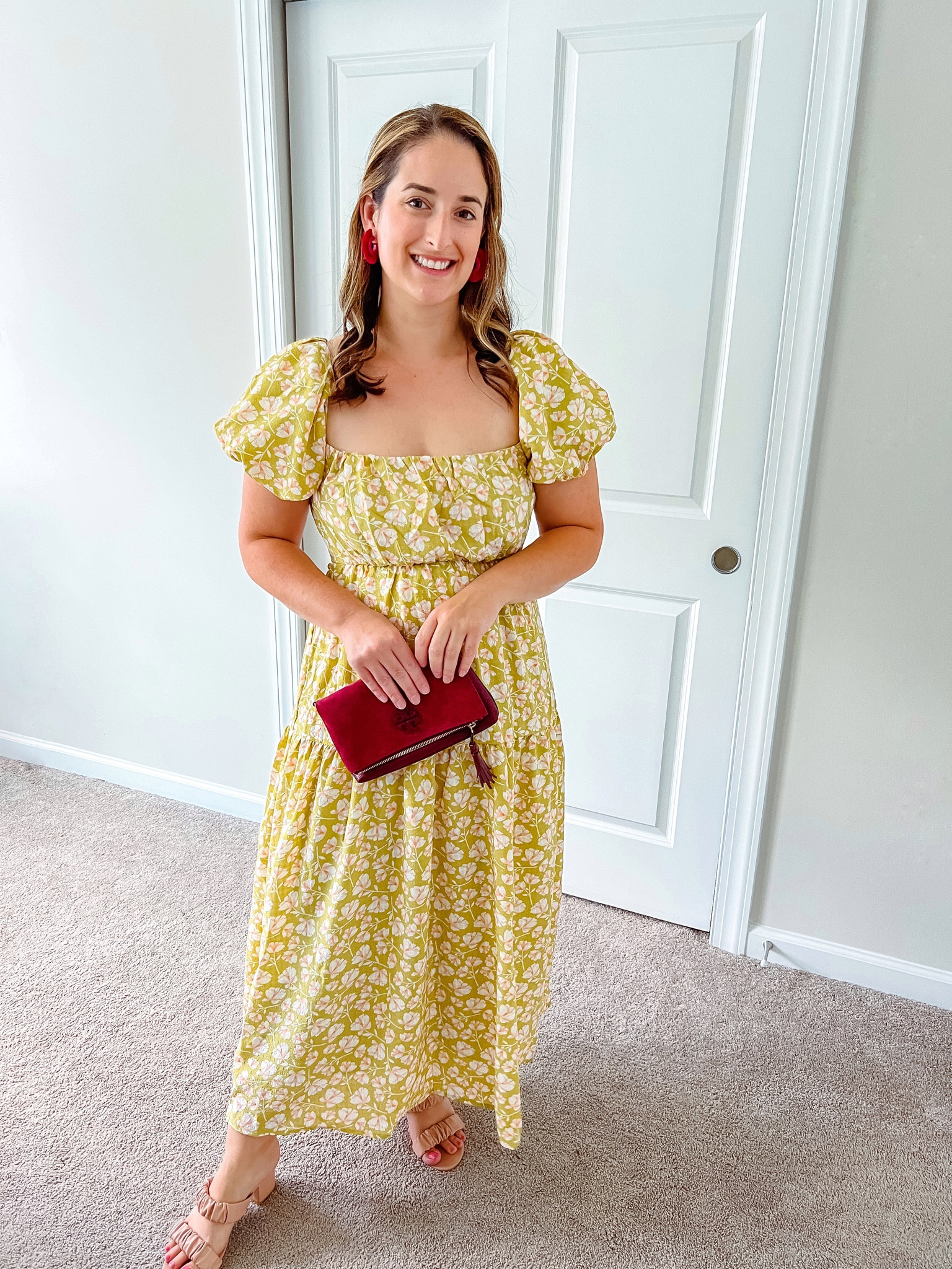This open back olive green and floral peach pink puff sleeve dress is the perfect pick for a fall wedding! I’m wearing it next week to one! I paired it with some fan fringe hoops, Nude pink sandals, and a maroon clutch bag  I’m wearing a size medium. Comes in a blue too! 

#LTKstyletip #LTKsalealert #LTKwedding