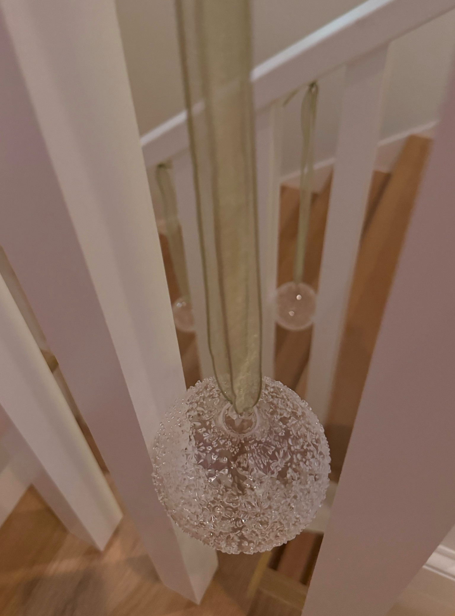 I hung these gorgeous glass ornaments from cup hooks under the railing using Platinum organza ribbon. These ornaments have 3 shapes and fit perfectly in spindles. 

#LTKHoliday #LTKSeasonal #LTKHome