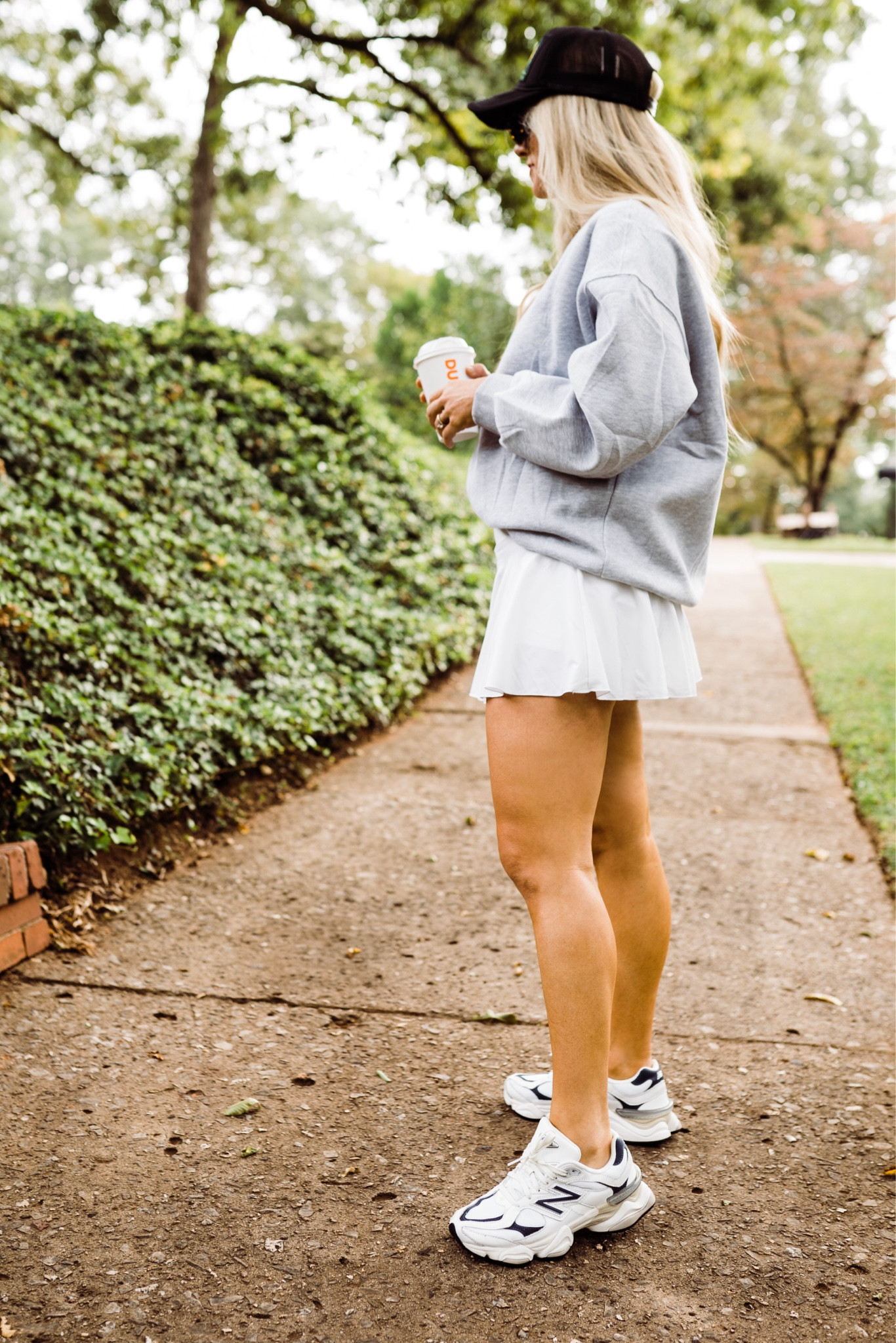 New balance 9060 in stock!!Lululemon skirt 
Amazon sweatshirt 
Free people trucker hat

#LTKshoecrush #LTKfitness #LTKfindsunder50