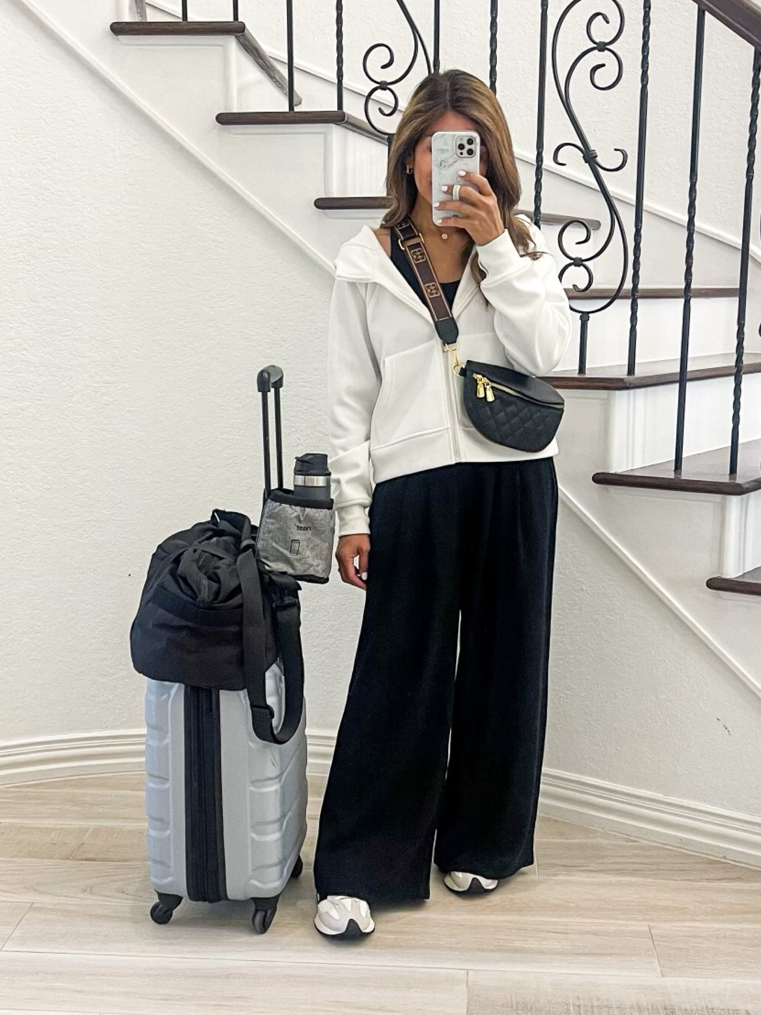 Airport Outfit, Travel Outfit.
Tank top I sized up to size 6. I have this in 3 colors. It’s so good! Has built-in bra.
Linen wide leg pants in small tts.
New Balance sneakers fit tts.
White full zip-up hoodie jacket in small tts. Very comfy.
Travel bags, belt bag,  and accessories are also linked.

Amazon finds, Amazon fashion, fall outfit, fall fashion, white sneakers, mom style, comfy outfit, wide leg pants, casual outfit.

Follow my shop @elvieinthecity on the @shop.LTK app to shop this post and get my exclusive app-only content!

#liketkit #LTKFind #LTKover40 #LTKtravel
@shop.ltk
https://liketk.it/4hCPi

#LTKunder50 #LTKover40 #LTKstyletip