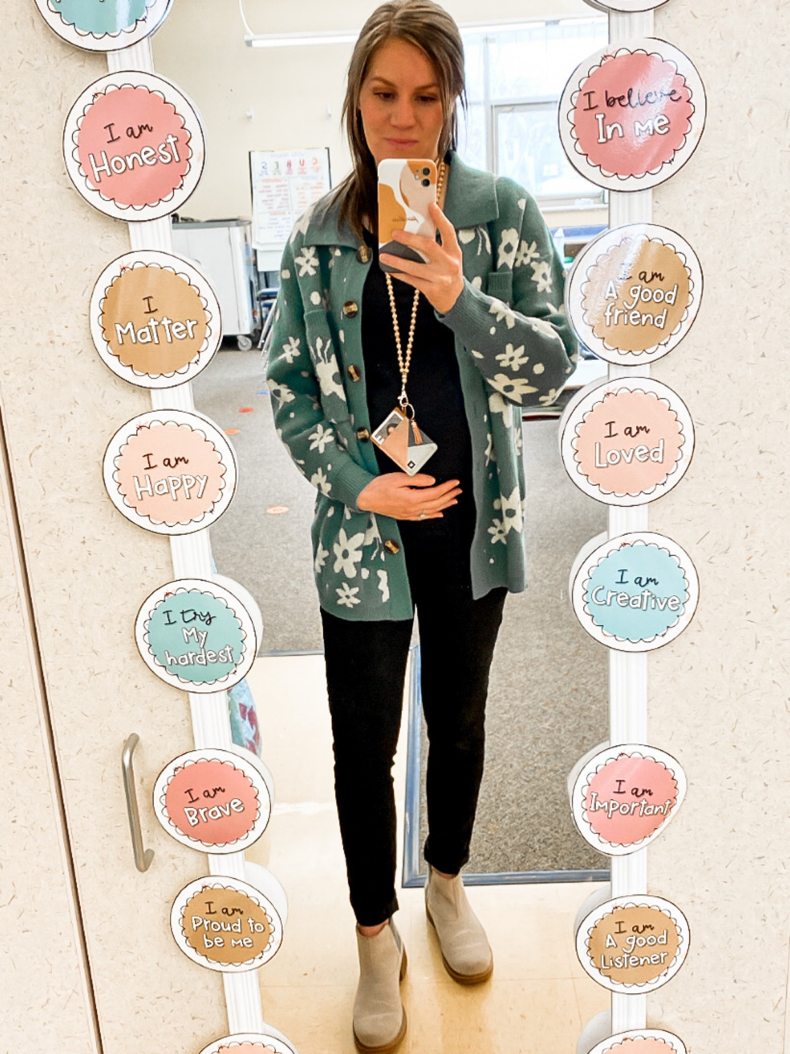 Black on black with a pop of color! 🙌🏻
These have been my favorite maternity jeans for work. The elastic band is really small and just in the front. Perfect for beginning months of pregnancy. I’m wearing a size small in everything. 

#LTKunder50 #LTKstyletip #LTKbump