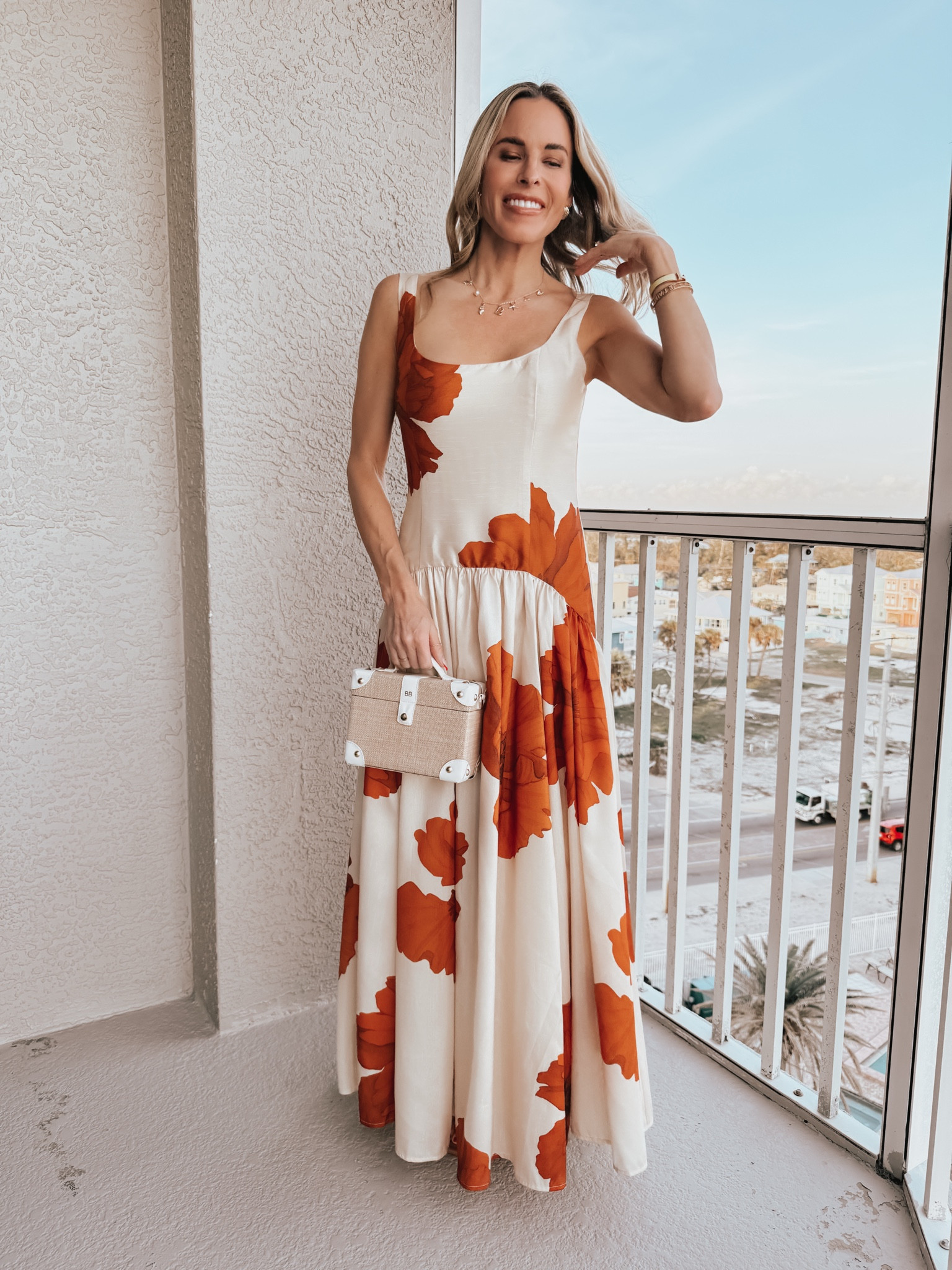 Pretty drop waist dress with monogrammed rattan bag  

#LTKTravel #LTKSeasonal #LTKOver40