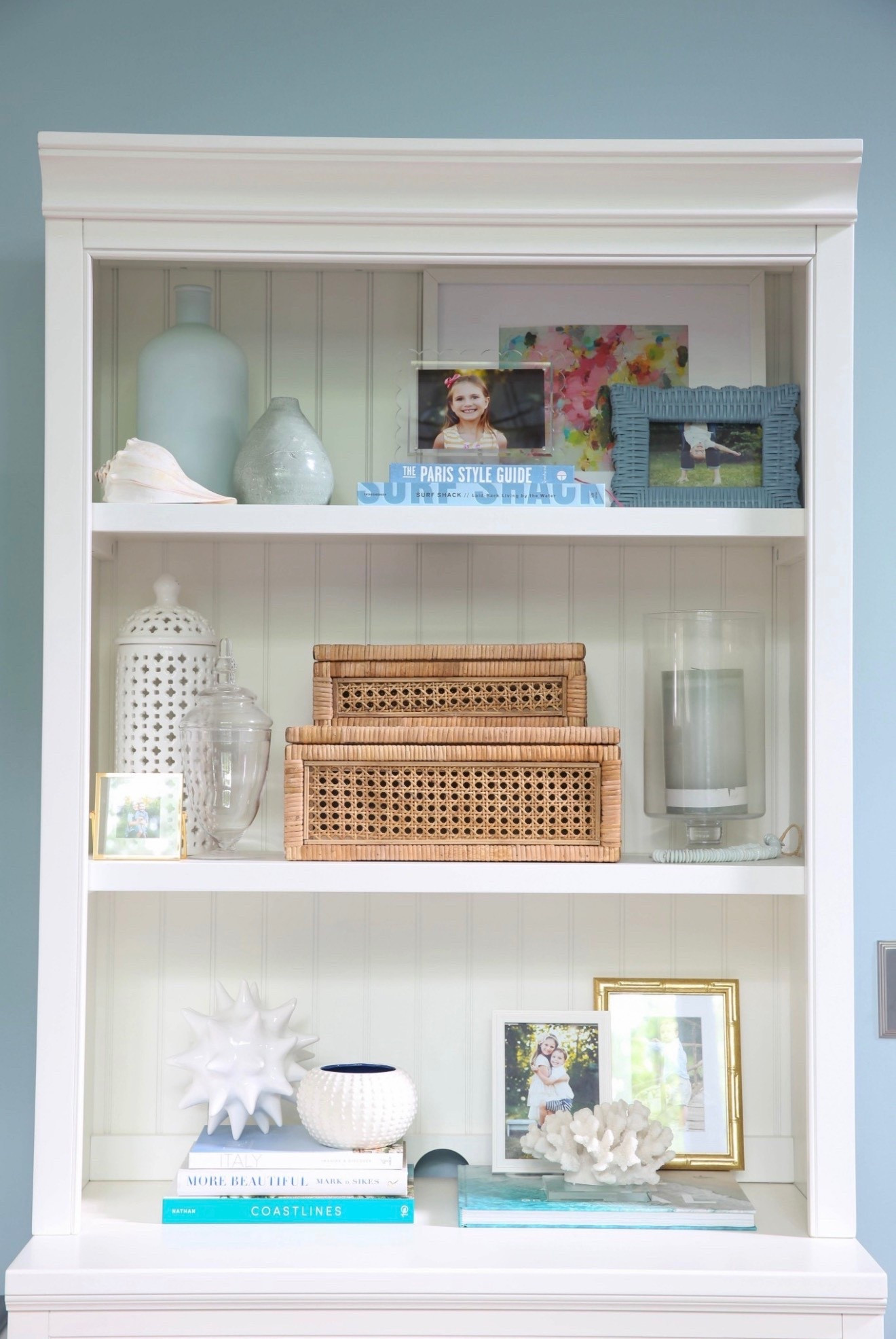 My shelf styling is all about blue and white coastal decor on this white Pottery Barn bookcase for a clean, layered, designer-inspired look. I love mixing coastal accessories, neutral textures, and modern coastal accents to keep it bright and curated, not cluttered.



#LTKHome #LTKSaleAlert #LTKU