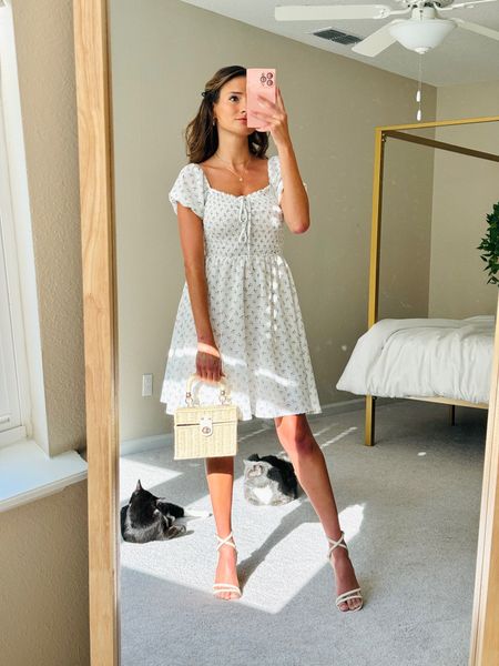 I love this smocked mini-dress for
summer! It’s easy to dress up with a rattan handbag and strappy heels. Shop it here! #ootd #vacay #vacation #minidress #dress #heels #beach #pool #summer 

#LTKtravel #LTKparties #LTKfindsunder50