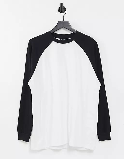 ASOS DESIGN oversized long sleeve t-shirt with contrast raglan seam in white and black | ASOS (Global)