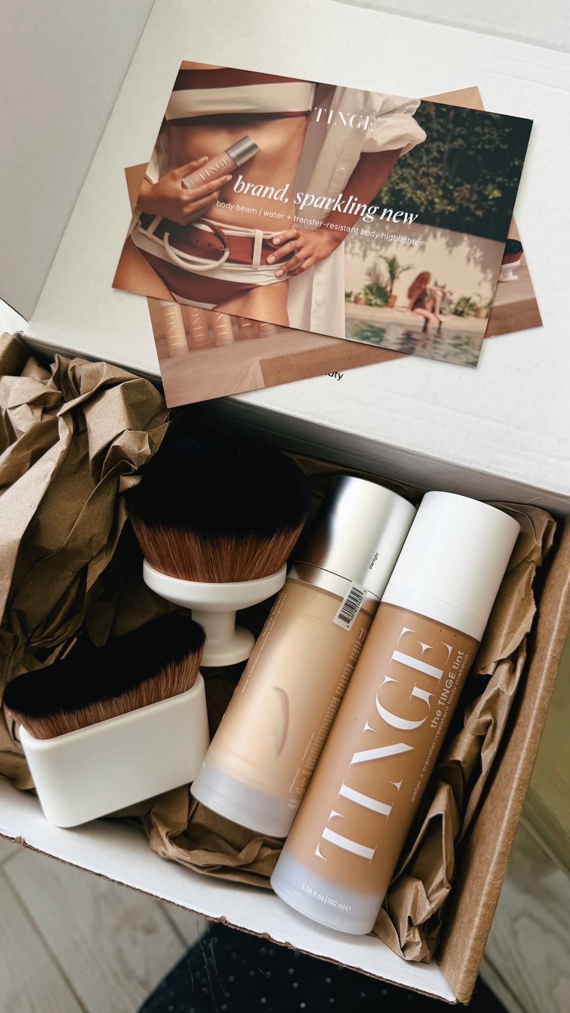 Okay this one has me curious. TINGE just landed on my doorstep and I have been wanting to try it for a while.

It is body makeup, but the water and transfer resistant kind. So it evens out and glows up your skin without rubbing off on your clothes, your car seats, or washing away the second you get in the pool. For a family that basically lives at the beach, that is the whole ballgame. Even legs, a little glow, and nothing left behind on a white swim coverup.

They gifted me the TINGE tint and the body beam highlighter in Starlight, plus the brushes to put it on. I am testing it this week and will report back on how it actually wears on real skin in real Hawaii humidity.

Everything is linked here if you want to grab it and try it alongside me. 🫶🏼🤎

#LTKdayinmylife #LTKBeauty #LTKgrwm