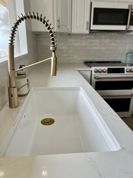 🚨🚨Love this workstation sink. Swapped out the drain so it would match kitchen hardware & appliances. This faucet (on sale) with sensor is such a great feature (especially with kids)  

#LTKsalealert #LTKhome #LTKFind
