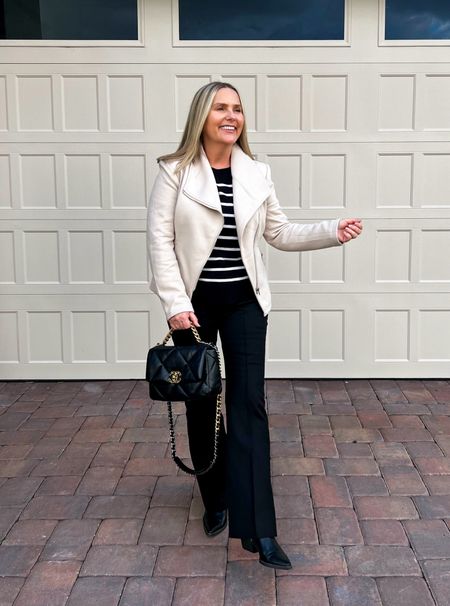 Black and white. Knit moto jacket in white, flare black pants, striped sweater and cowboy boots/western boots.
Use my code JONA10 for 10% off the jacket.

#LTKstyletip #LTKfindsunder100 #LTKfindsunder50