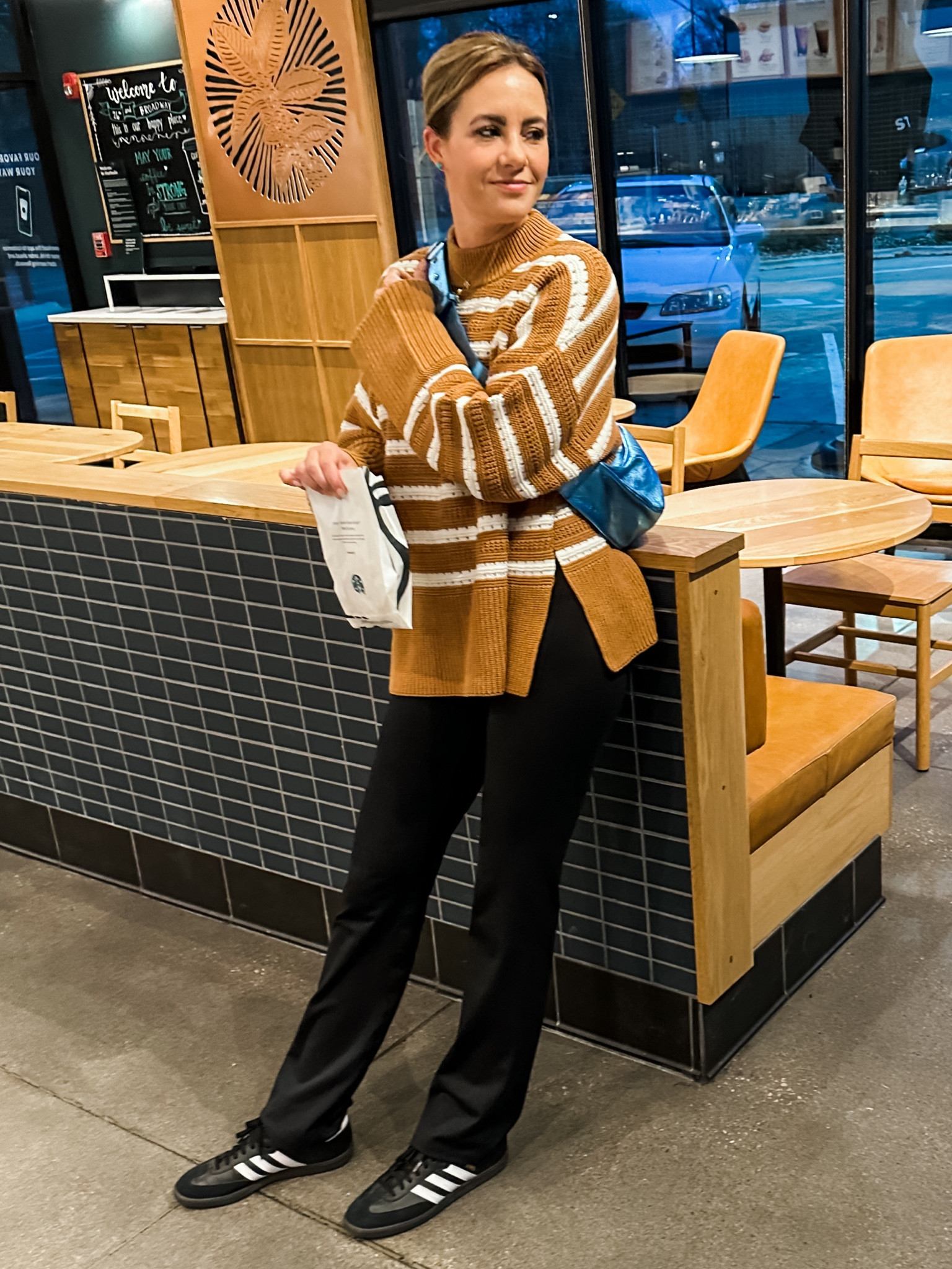 Rainy Day Outfit 🍯☕️🦋 // flare leggings, oversized sweater, striped jumper, honey sweater, sambas, adidas sneakers, trainers, cross body bag, leather Crossbody, blue bag, metallic bag, waterproof jacket, Bomber casual style

#LTKstyletip #LTKitbag
