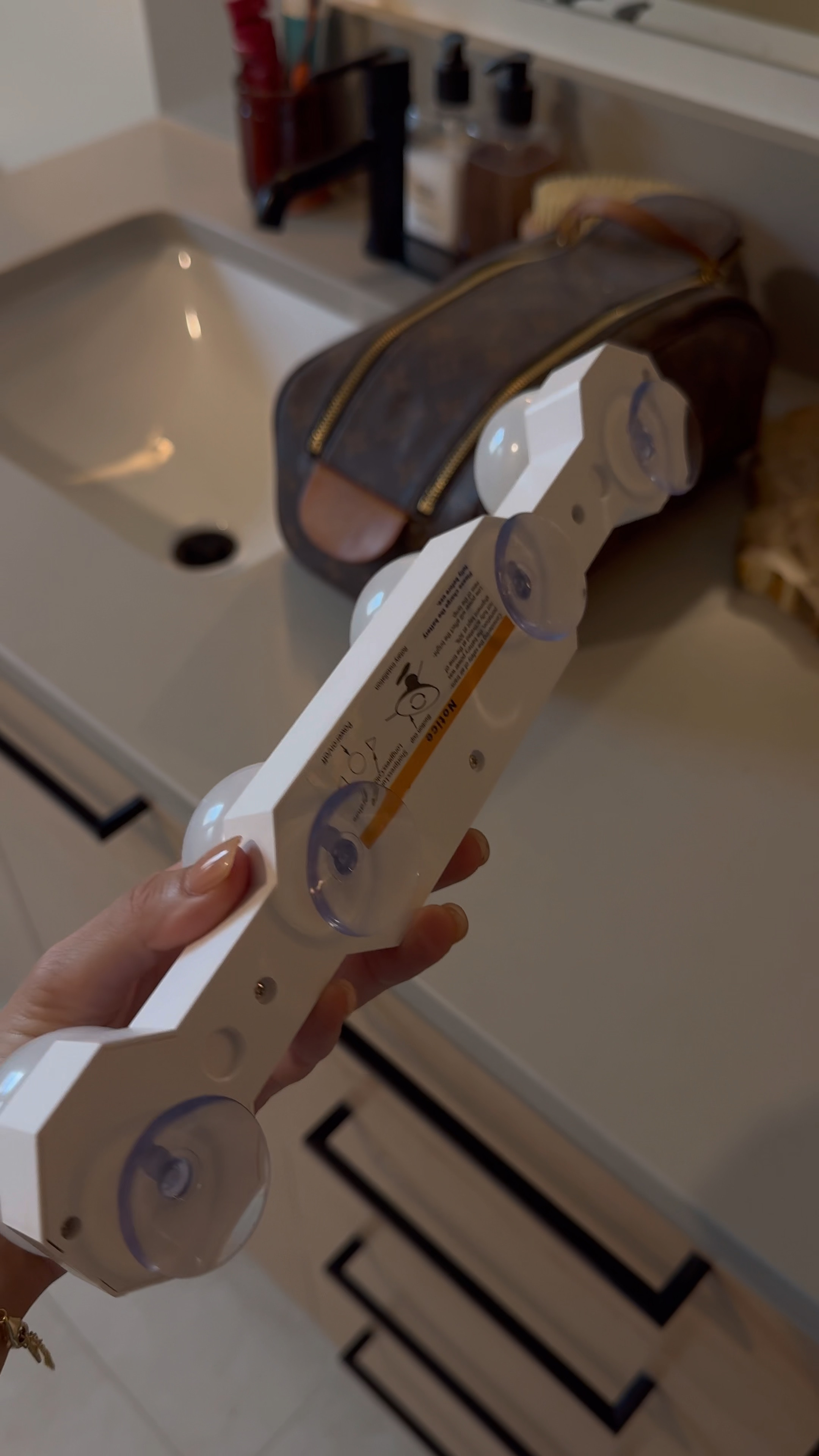 Amazon vanity light suction cups to your mirror, changes light tones, adjusts brightness - under $25!