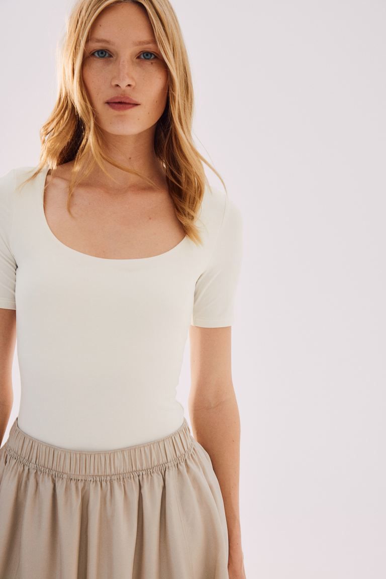 Short-sleeved Thong Bodysuit - Low-cut Neckline - Short sleeve - White - Ladies | H&M US | H&M (US + CA)