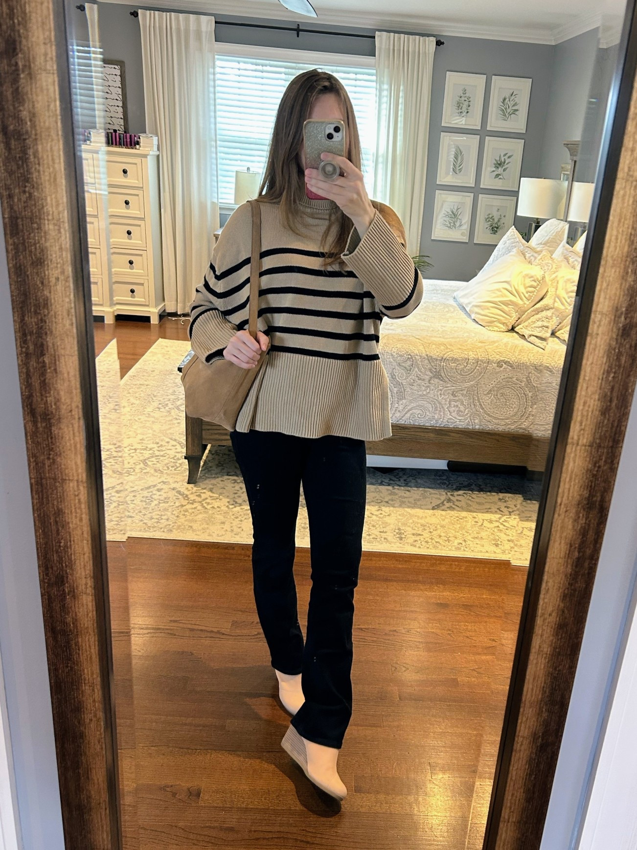 I’m enjoying mixing black and brown in my outfits. Here, I’ve paired an oversized Gap sweater from last year with a pair of boot cut black pants. I like how the loose, slouchy top is balanced by the fitted bottoms. If you like this look, check your closet for similar pieces, or check out the links I’ve included.

Top: split hem, oversized sweater by Gap (similar options linked)
Denim: mid rise boot cut jeans from Old Navy in black, sz 0 (exact item linked)
Boots: Tom’s Kelsey boot in natural (same boot, different color linked)
Purse by Mango (exact item linked)

#OOTD #FallOOTD #blackandbrown #casualoutfit

#LTKStyleTip #LTKOver40