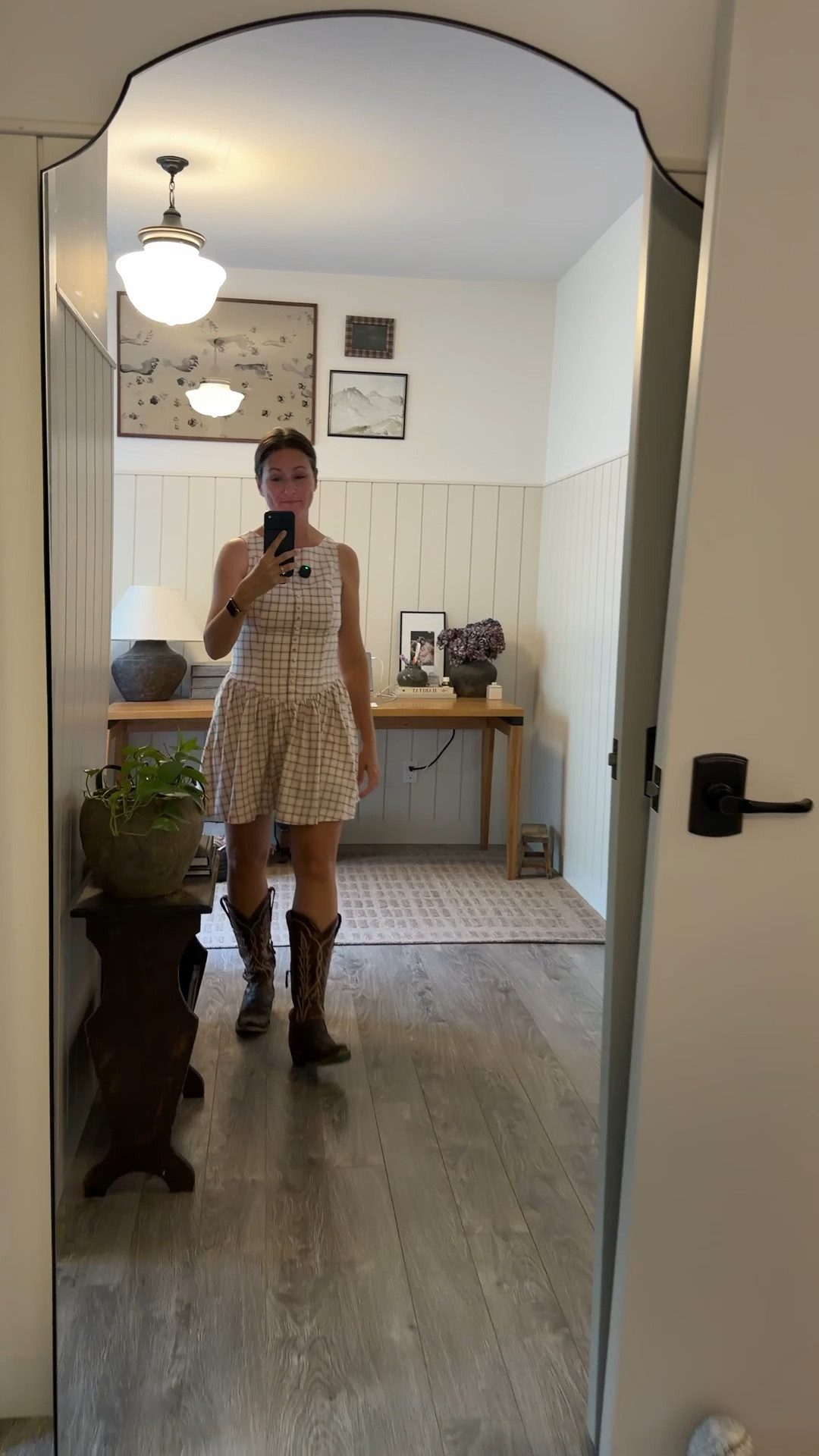 I bought this high neck button-embellished mini dress from Abercrombie and I'm obsessed with it for date night. It's on sale right now for $55, marked down from $90, so it's a steal for under $60. The details are what sold me: a high neck with non-functional buttons running down the front, a dipped waist, a flowy skirt, and a smocked back that gives it the perfect fit without needing to size up or down. It comes in a few colors, so there's an option no matter your style. This one is going straight into my date night rotation. It's linked here if you want to grab it before it sells out. I’m wearing a small.