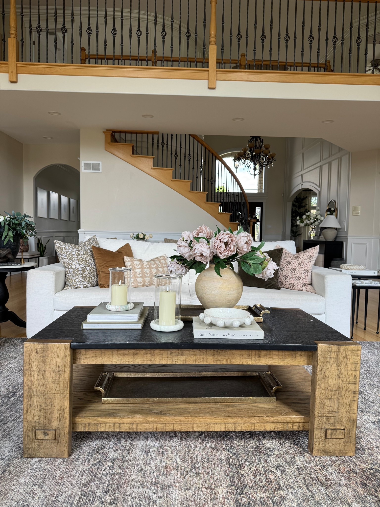 Coffee table styling for summer! Added these beautiful hurricane candle holders with marble base and I am obsessed! These peonies are one of my favorite florals I ever bought! 

@potterybarn @amazon @amazonhome @target @targetstyle @mcgeeandco #wayfair #wayfairfinds #coffeetable #vase #potterybarn #afloral #summerhome #sale #coffeetabledecor #sofa #myalbanypark #rug #loloirugs #neutralhome 

#LTKSaleAlert #LTKSeasonal #LTKHome