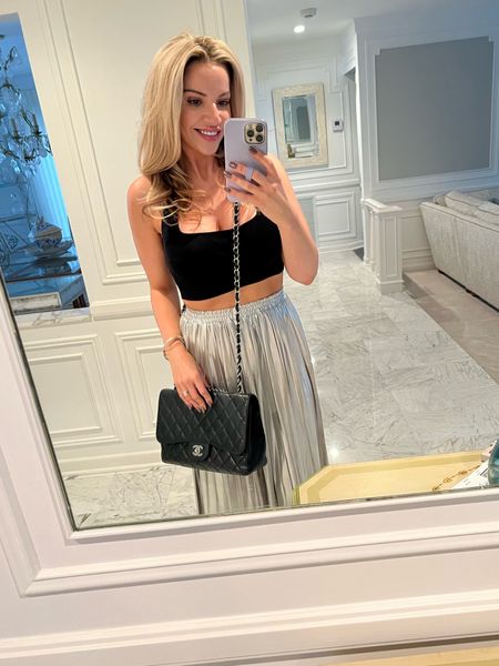 Date night outfit silver pleated midi skirt black crop top gold hoop earrings revolve holiday outfit 

#LTKstyletip #LTKHoliday #LTKfindsunder50