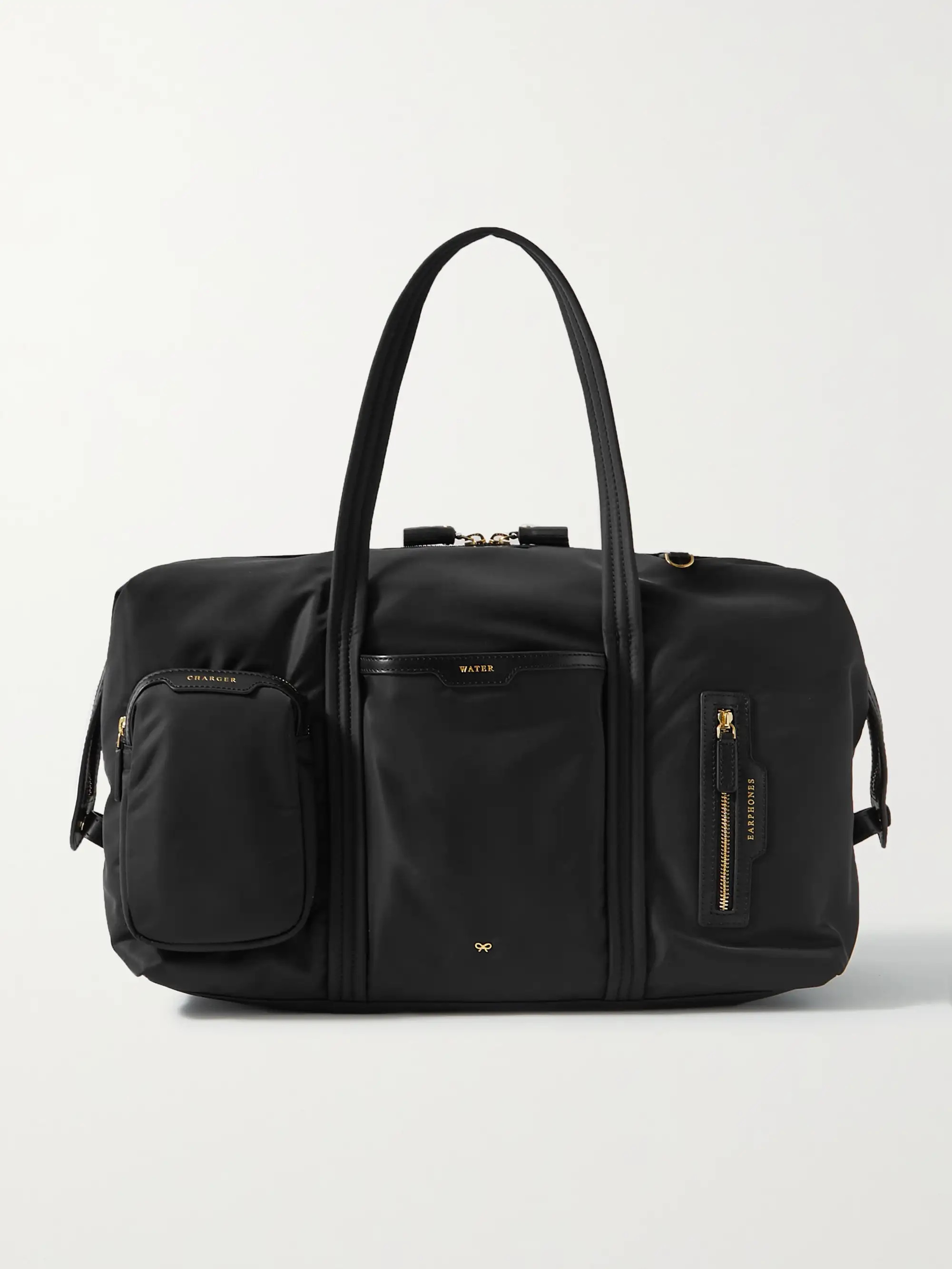 ANYA HINDMARCH+ NET SUSTAIN Inflight leather-trimmed recycled shell weekend bag | NET-A-PORTER (UK & EU)