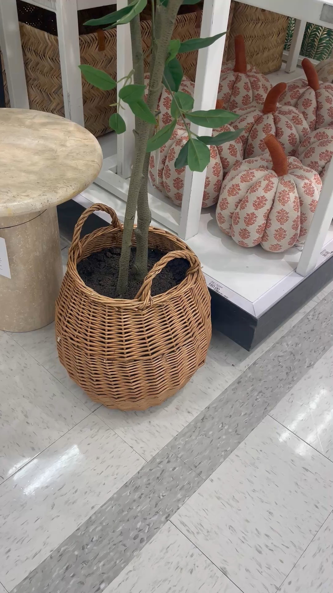 Faux tree in rattan basket perfect for fall decor! 