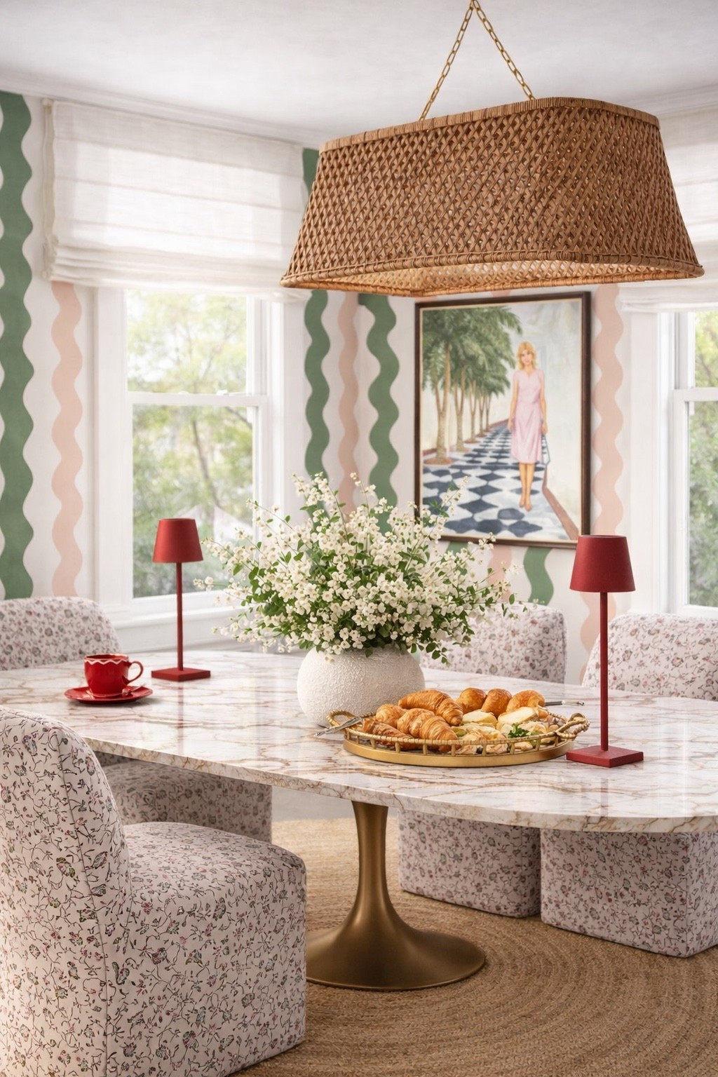 
Imagine starting your morning in this chic breakfast nook, bathed in soft sunshine.

This modern chic marble table keeps the space feeling elevated and sculptural — but the real magic is in the contrast.

The Flora dining chairs bring that romantic, whimsy softness, and paired with the bold geometric wallpaper, the tension between the two creates such a beautiful balance. Structured meets organic. Graphic meets floral. That contrast is everything.

The red-tinted lamps layered over the round jute rug warm up the marble and soften the whole composition. And the sheer Roman shades filter the light just enough to create that dreamy morning glow.

A subtle touch of red makes the space feel alive — and yes, it absolutely makes breakfast more inviting ❤️

Modern. Playful. Intentionally layered.

#FloraDiningChair #geometricwallpaper #breakfastnook #marbletable #modernchic #curatedhome #editorialstyle #diningroomdesign #morninglight #homeinspo

#LTKmorningroutine #LTKdayinmylife #LTKHome