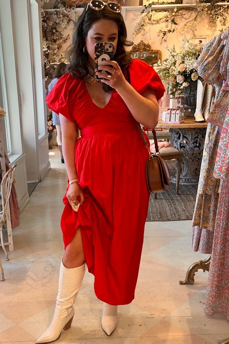 Red puff sleeve midi dress, pearl charm necklace, white cowgirl boots 