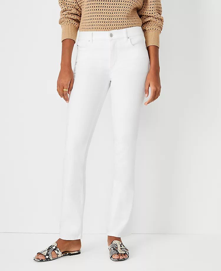 Sculpting Pocket Mid Rise Slim Boot Cut Jeans in White | Ann Taylor | Ann Taylor (US)