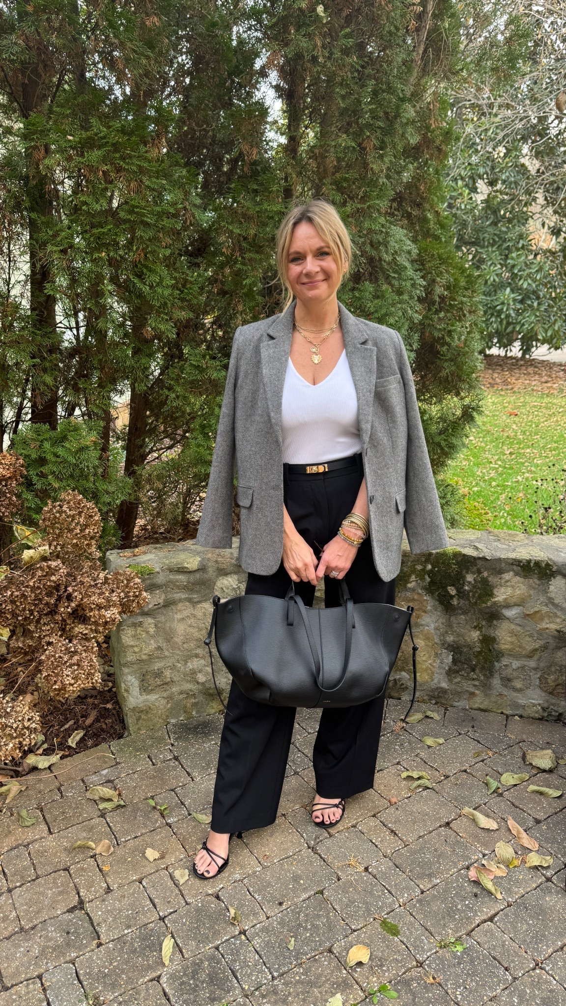 This is one of our favorite ways to style a blazer for work or client meetings because it’s all about the details. A tailored blazer layered over a simple cami and black trousers creates a clean, elevated foundation. But it’s the finishing touches that make the look feel truly polished. A great belt defines the waist and adds structure, while minimal jewelry and classic heels keep things refined. Finished with a sleek black tote bag, the outfit feels intentional, professional, and practical all at once. It’s an easy formula you can rely on when you want to look confident, put together, and still like yourself—without overthinking it.



#LTKootd #LTKdayinmylife #LTKgrwm