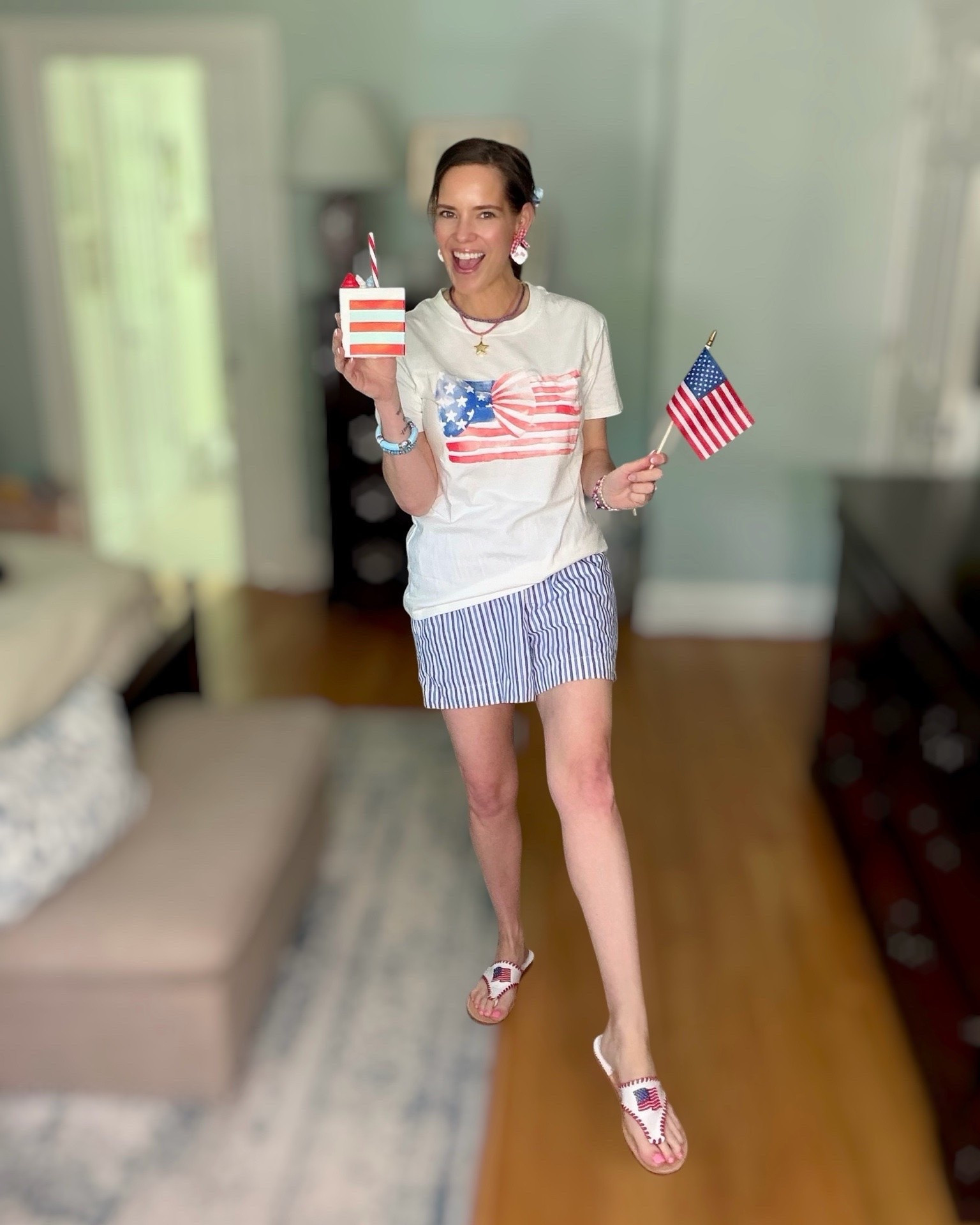 🇺🇸 Preppy Patriotic Outfit Idea ❤️🤍💙

Red, white & cute 🇺🇸❤️🤍💙 Loving this affordable patriotic outfit for summer celebrations, Memorial Day, the 4th of July, parades, backyard BBQs, and all the festive moments 🎆 This watercolor American flag bow tee paired with blue striped boxer shorts is such an easy, comfy look! Added the cutest patriotic sandals, statement earrings, layered jewelry, and a sweet bow scarf for a fun preppy touch 🎀✨

patriotic outfit, 4th of July outfit, patriotic graphic tee, American flag shirt, striped boxer shorts, patriotic sandals, red white and blue outfit, preppy summer outfit, Memorial Day outfit, July 4th style, patriotic accessories, affordable summer fashion, casual patriotic look 🇺🇸✨

#LTKOver40 #LTKSeasonal #LTKootd