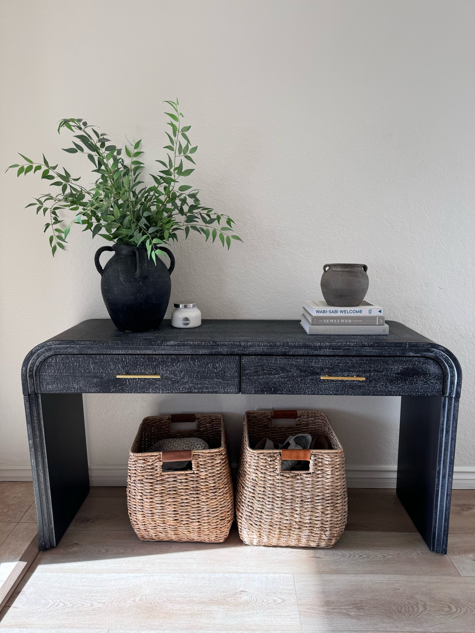 Entryway console where we keep our shoes!
Greenery also linked

#LTKStyleTip #LTKFindsUnder100 #LTKHome