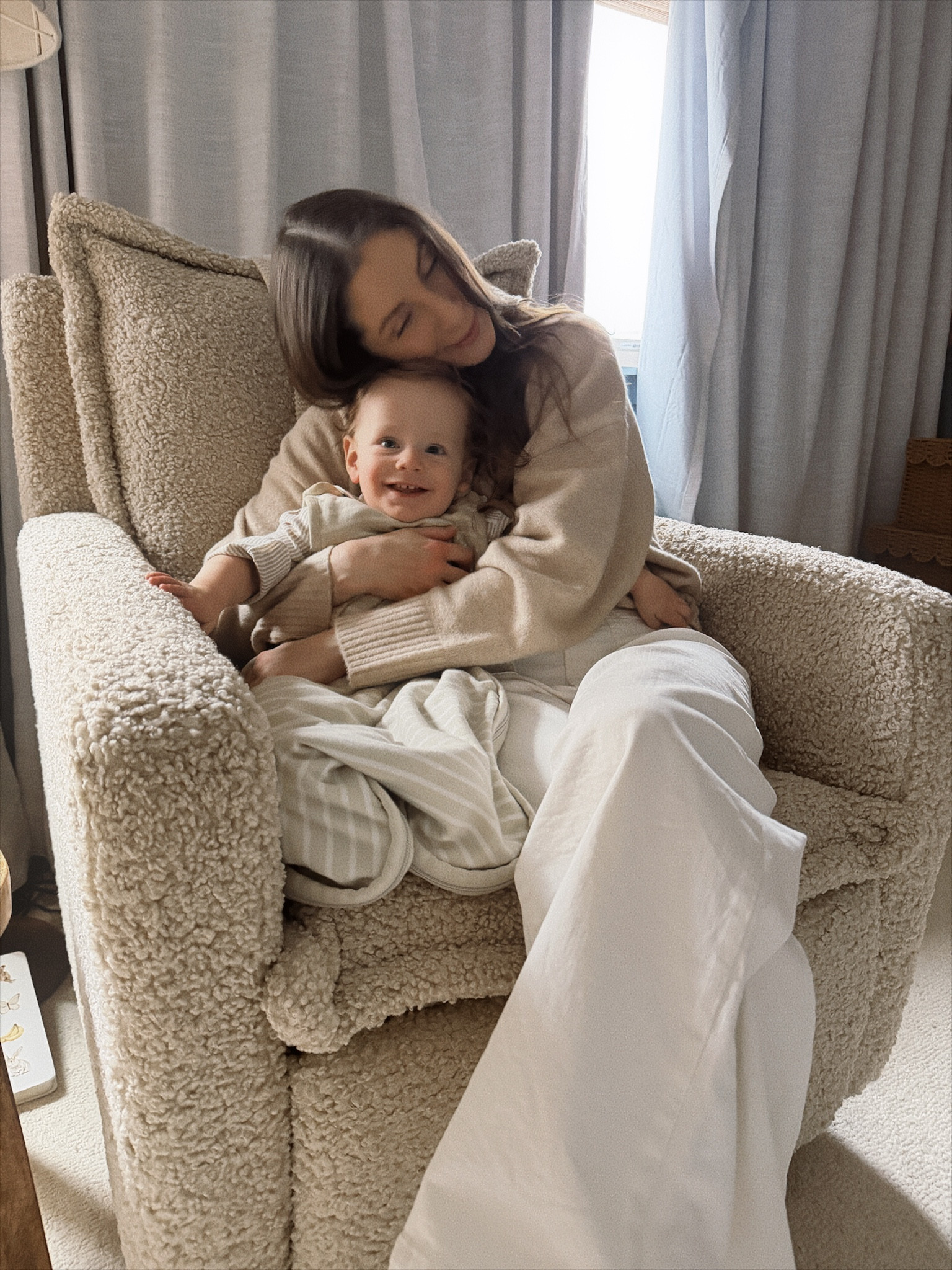 Birthday hugs for my boy - him in his favorite sleep sack and us in our favorite comfy nursery glider! The amount of time I have spent in this chair over the past year.....

#LTKmomlife #LTKHome #LTKBaby