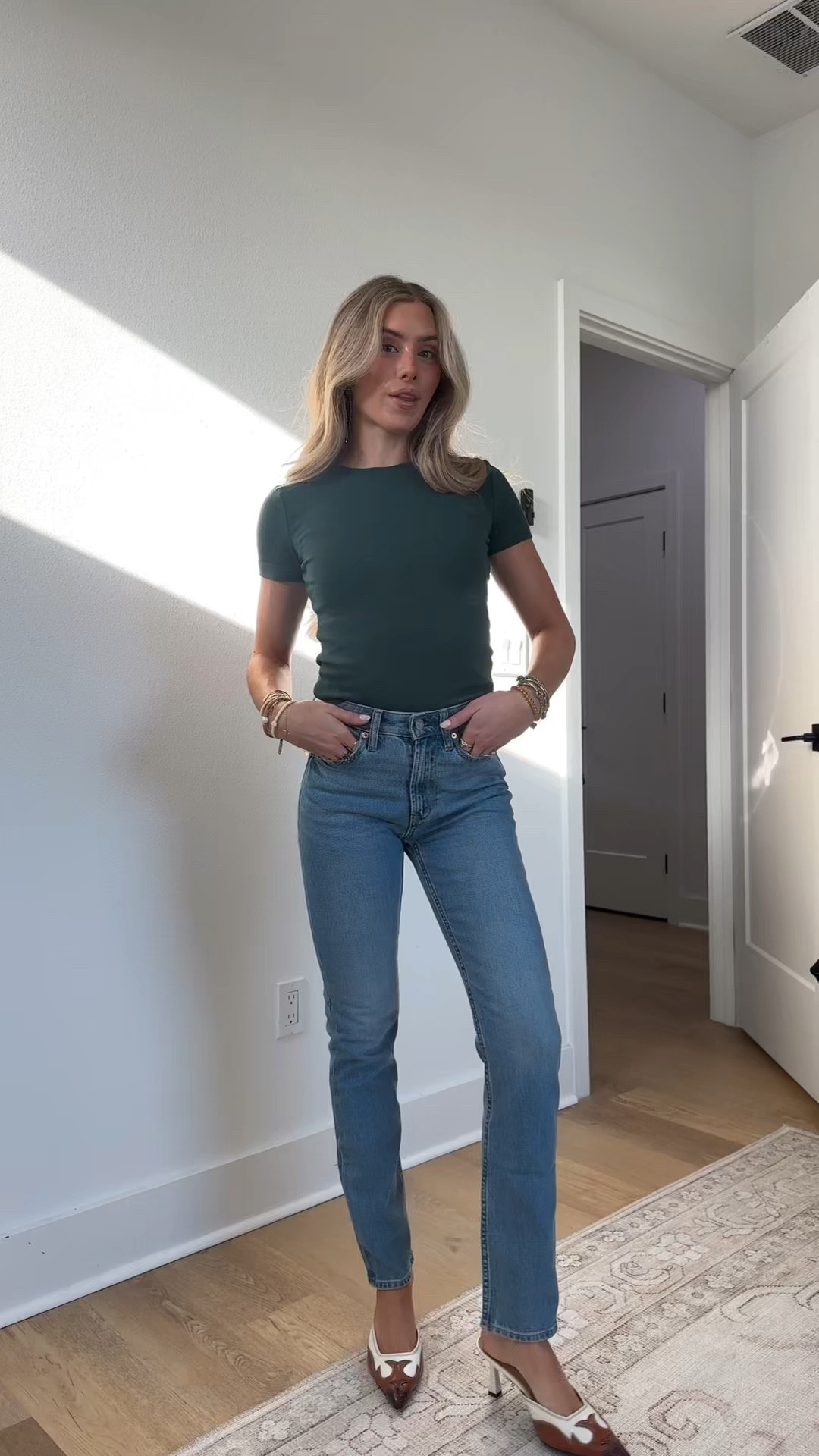 These jeans are from Gap size 24/00 curvy high rise 90s straight leg. A vintage-inspired fit that always feels current. Now in a curvy fit with extra room in the hip and thigh. Fit: A full-length classic straight-leg jean that's slim through the hip & thigh. Fabric: 83% Cotton, 11% Recycled Polyester, 5% Recycled Cotton, 1% Elastane. Stretch: Low Stretch Jeans. Looks like vintage denim but feels like you've had them forever. ​Easy & comfortable with a little secret stretch. Rise: High Rise Jeans. Look: A classic five-pocket jean in medium indigo wash. Details: Zip fly, five-pocket styling & holds-you-in front pockets.​
The Carolyn Basette Kennedy effect from the new Hulu show, Love Story  @gap 

#LTKootd #LTKgrwm #LTKSaleAlert