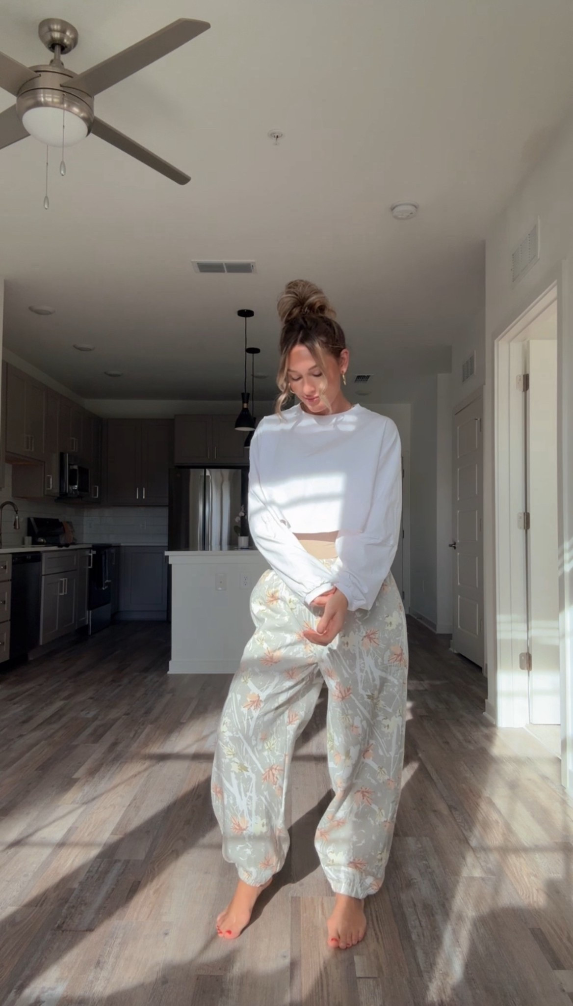 I’m 5’5” 130 lbs wearing a medium in pants and small in top