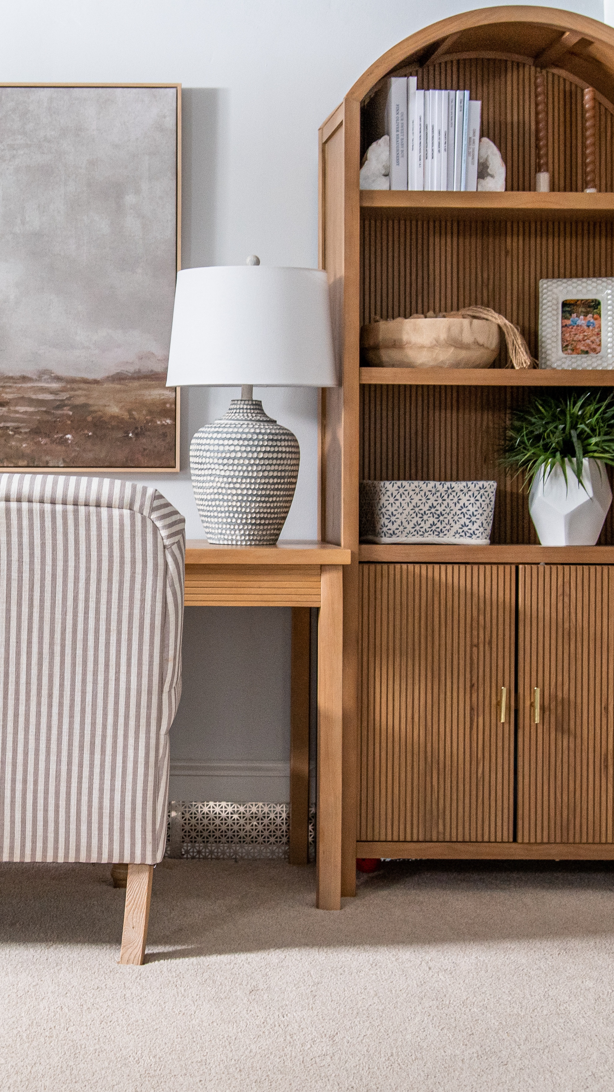 Basement renovation into a functional home office and family room with Target items, including desk, hutch, lamp, artwork, armchair, and more coastal style home decor

#LTKfamily #LTKhome