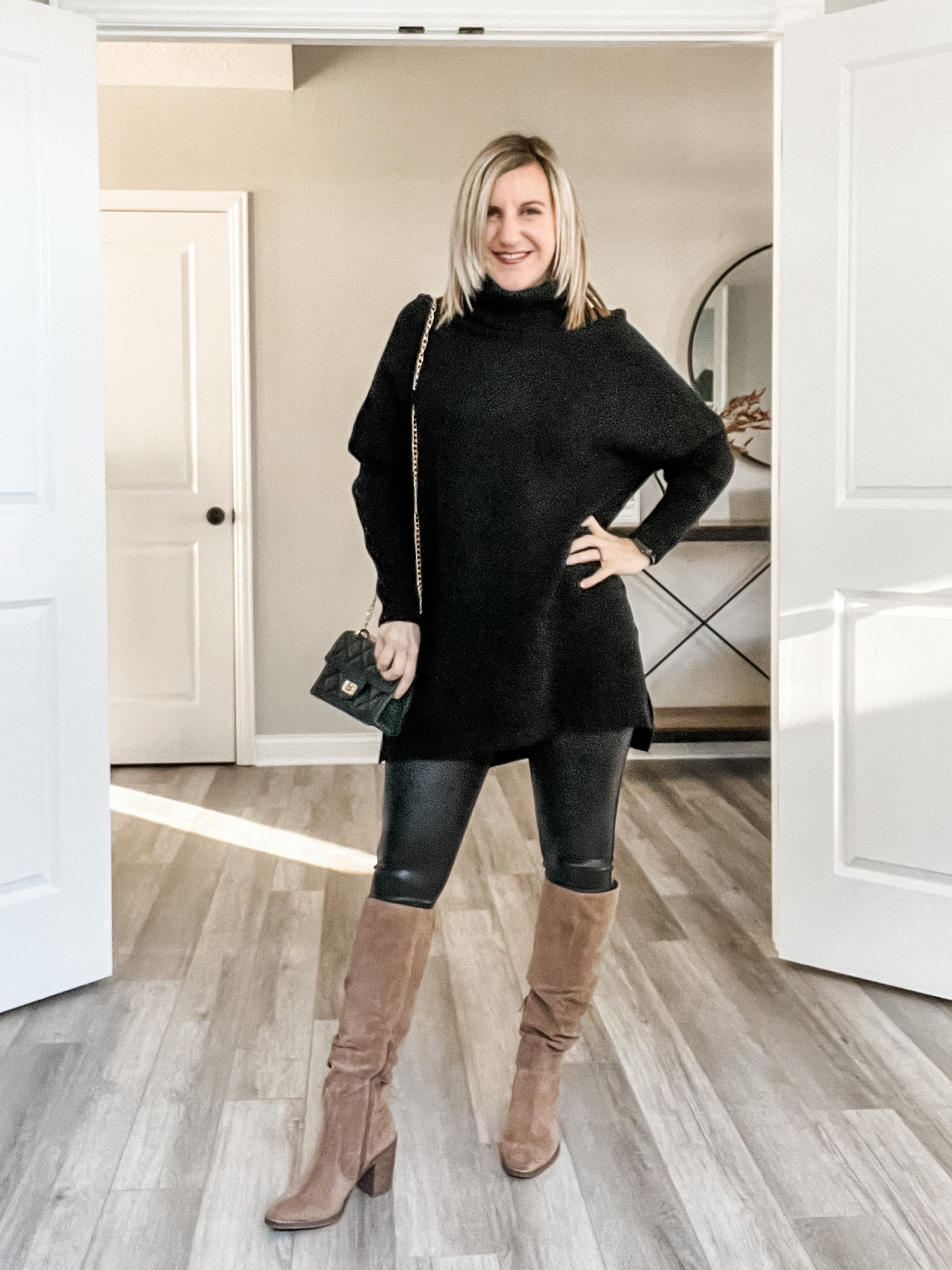 How to style your faux leather leggings this winter. Pair them with this oversized tunic sweater from Amazon and tall tan boots from Target. Wearing a small in this tunic and it is long enough to cover my booty. 
Christmas outfit, winter outfit

#LTKstyletip #LTKCyberweek #LTKHoliday