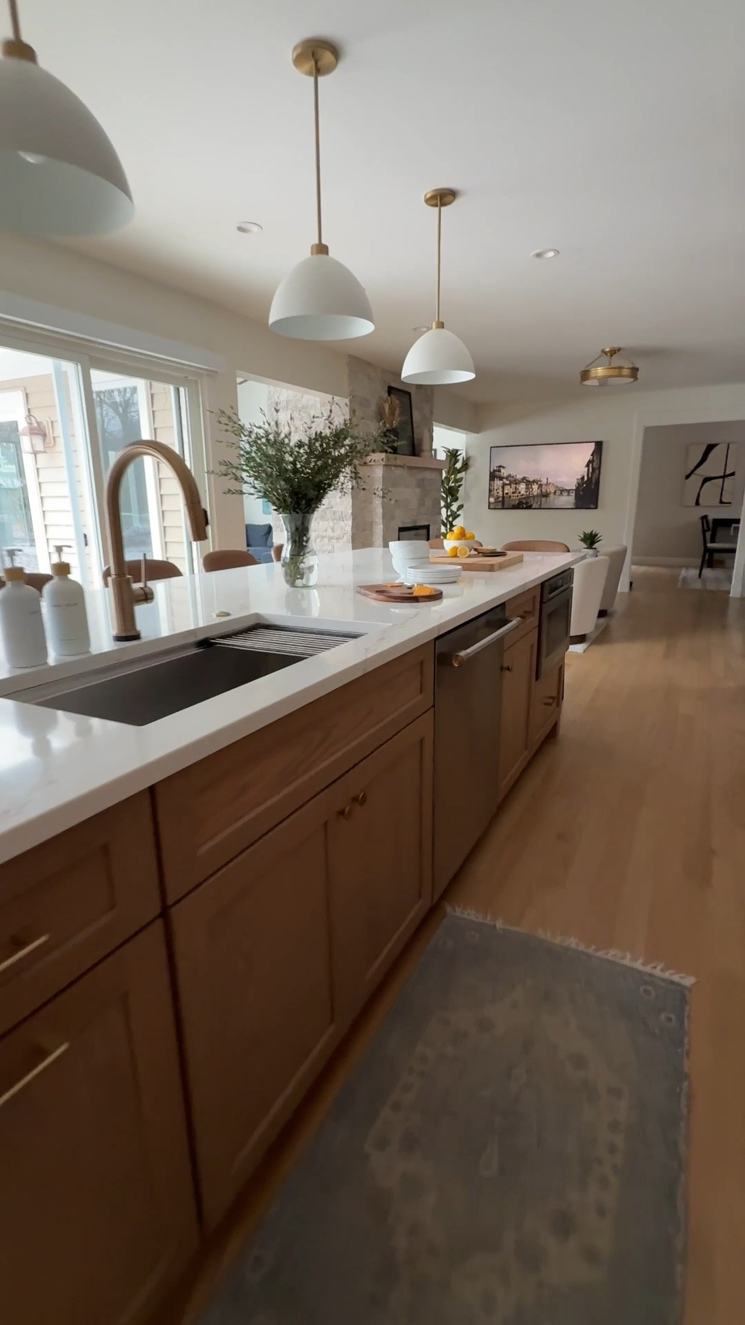 If your kitchen feels dark and cramped… don’t underestimate what a layout change can do.

This remodel swapped outdated finishes for shaker-style white oak cabinets (Minwax Weathered Oak) and Benjamin Moore White Dove walls.

The island now seats six. Natural light floods the space. And the navy wet bar (Westcott Navy) adds depth without overwhelming the room.

White oak or painted cabinets — what would you choose?

Full tour:
https://www.homebunch.com/before-and-after-kitchen-remodel-with-white-oak-cabinets/

Interior Design: @esslingerdesigncompany


#BeforeAndAfterKitchen
#WhiteOakCabinets
#ShakerCabinets
#BenjaminMooreWhiteDove
#KitchenRenovationInspiration
#NeutralKitchen
#KitchenDesignIdeas
#TimelessKitchen

#LTKmomlife #LTKHome #LTKOver40