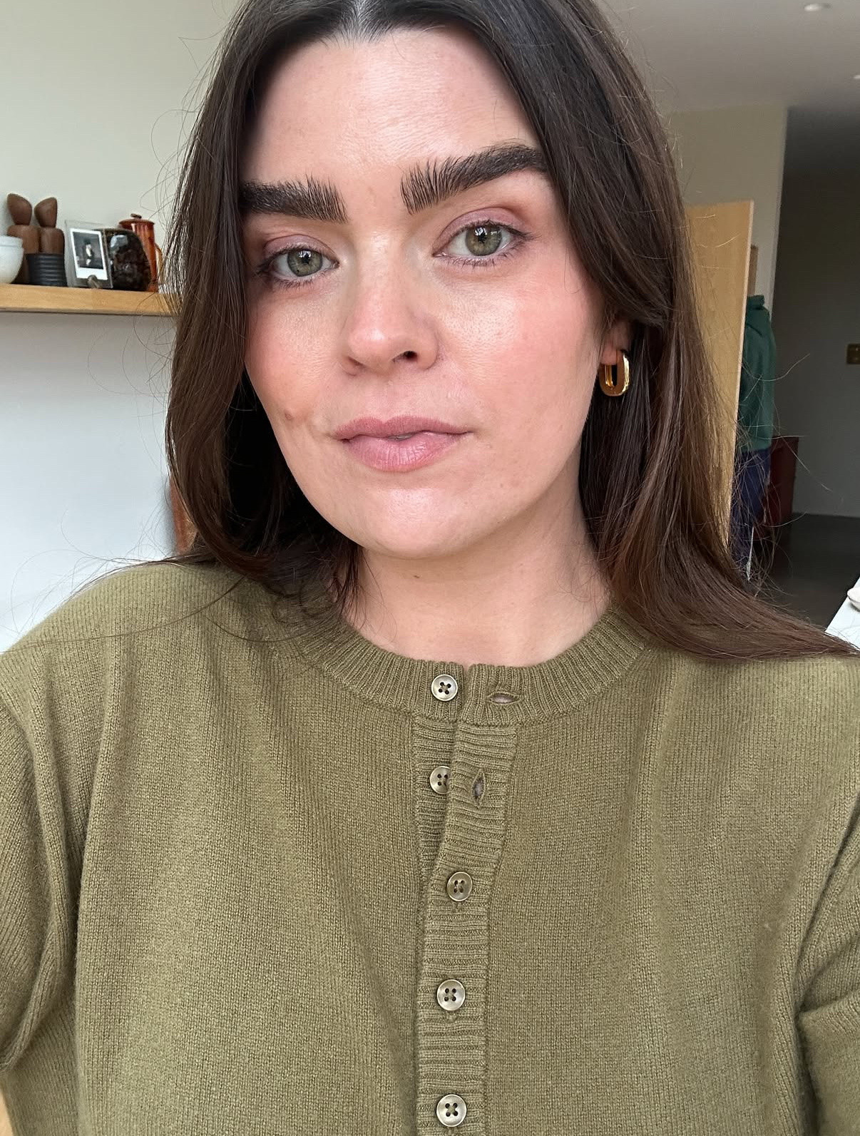 OOTD wearing my favourite shade of green in this gorgeous J.Crew cardigan with a pop of gold jewellery from Mejuri

#LTKstyletip #LTKautumn