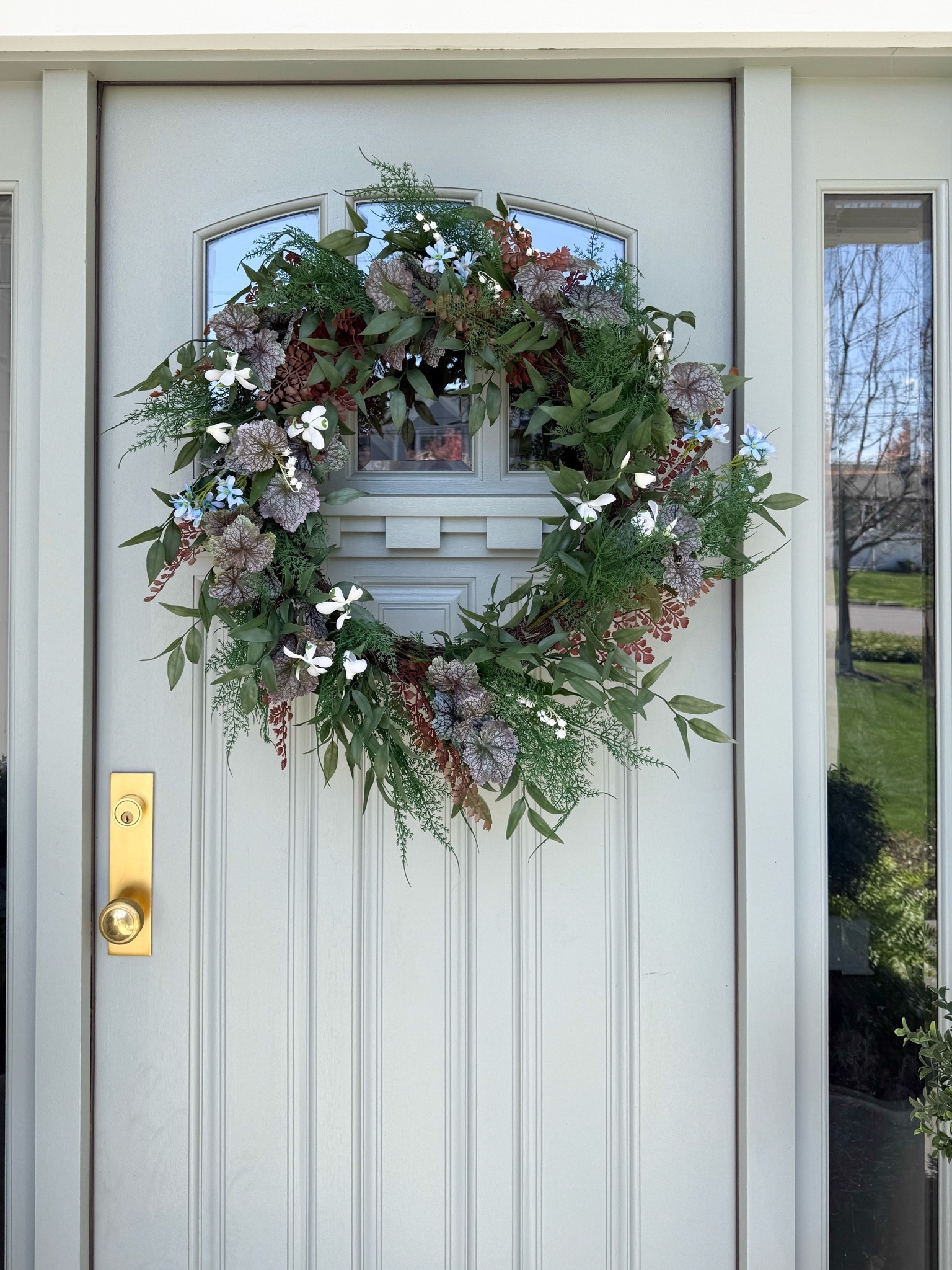 This oversized greenery wreath is such a beautiful way to bring color and texture to the front door. I love that it feels full and layered without being tied to one specific season.

front door wreath, greenery wreath, floral wreath, front porch decor, outdoor decor, seasonal home decor, entryway decor, home exterior, curb appeal, girlonthehudson

#LTKHome #LTKSeasonal #LTKdayinmylife