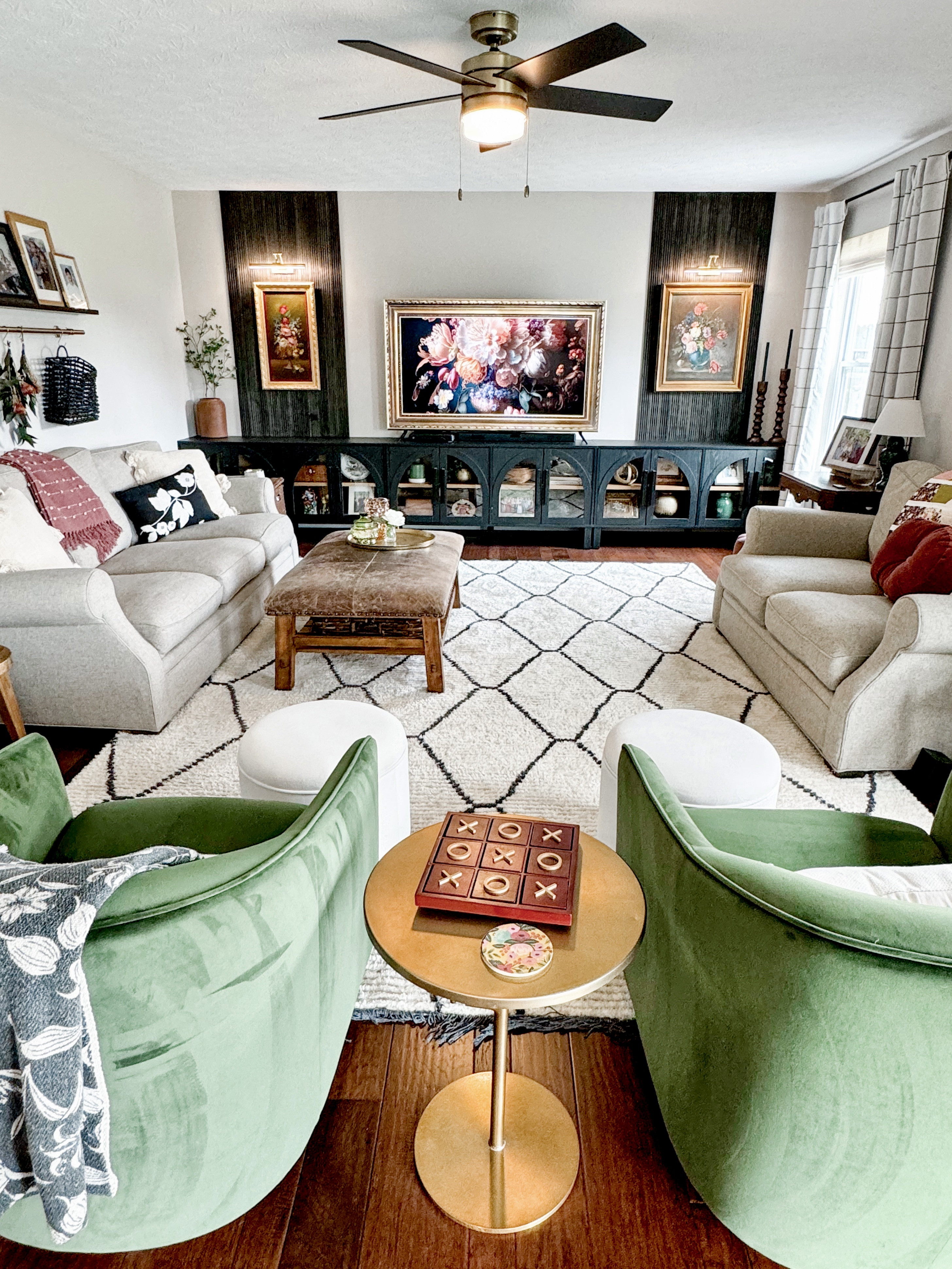 We put 3 of the viral Walmart console cabinets side by side to give a built in look on a budget! Those art lights are not hardwired, they are rechargeable. I also linked a ton of lux for less green accent chairs! 

#LTKFindsUnder100 #LTKHome #LTKStyleTip