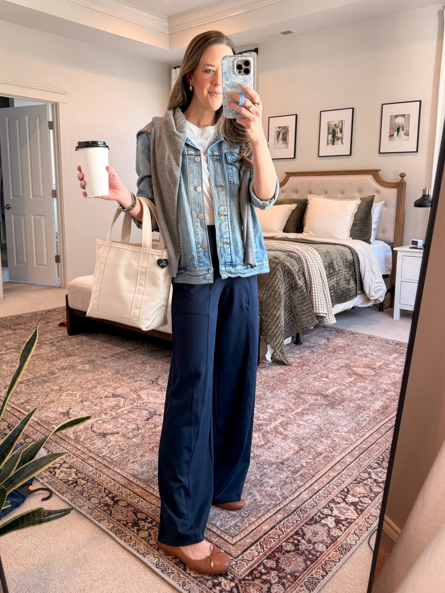 Elevated Casual Mom Outfit 🤍

• Levi’s boyfriend denim jacket
• Target white tee
• Amazon grey sweater (layered over shoulders)
• Old Navy athletic wide leg trousers
• Ralph Lauren brown leather flats

This is one of my favorite “polished but comfortable” outfit formulas.

Structured denim jacket + soft tee + flowy athletic trousers = comfortable enough for busy mom life, but still pulled together.

The sweater over the shoulders adds that classic, intentional layer that makes the whole look feel styled.

Perfect for:
• Casual chic mom outfits
• Athleisure workwear
• Wide leg trouser outfit
• Denim jacket outfit ideas
• School drop-off outfit
• Elevated everyday basics
• Capsule wardrobe mom style

Comfortable. Classic. Repeatable.

#LTKSeasonal #LTKootd #LTKmomlife
