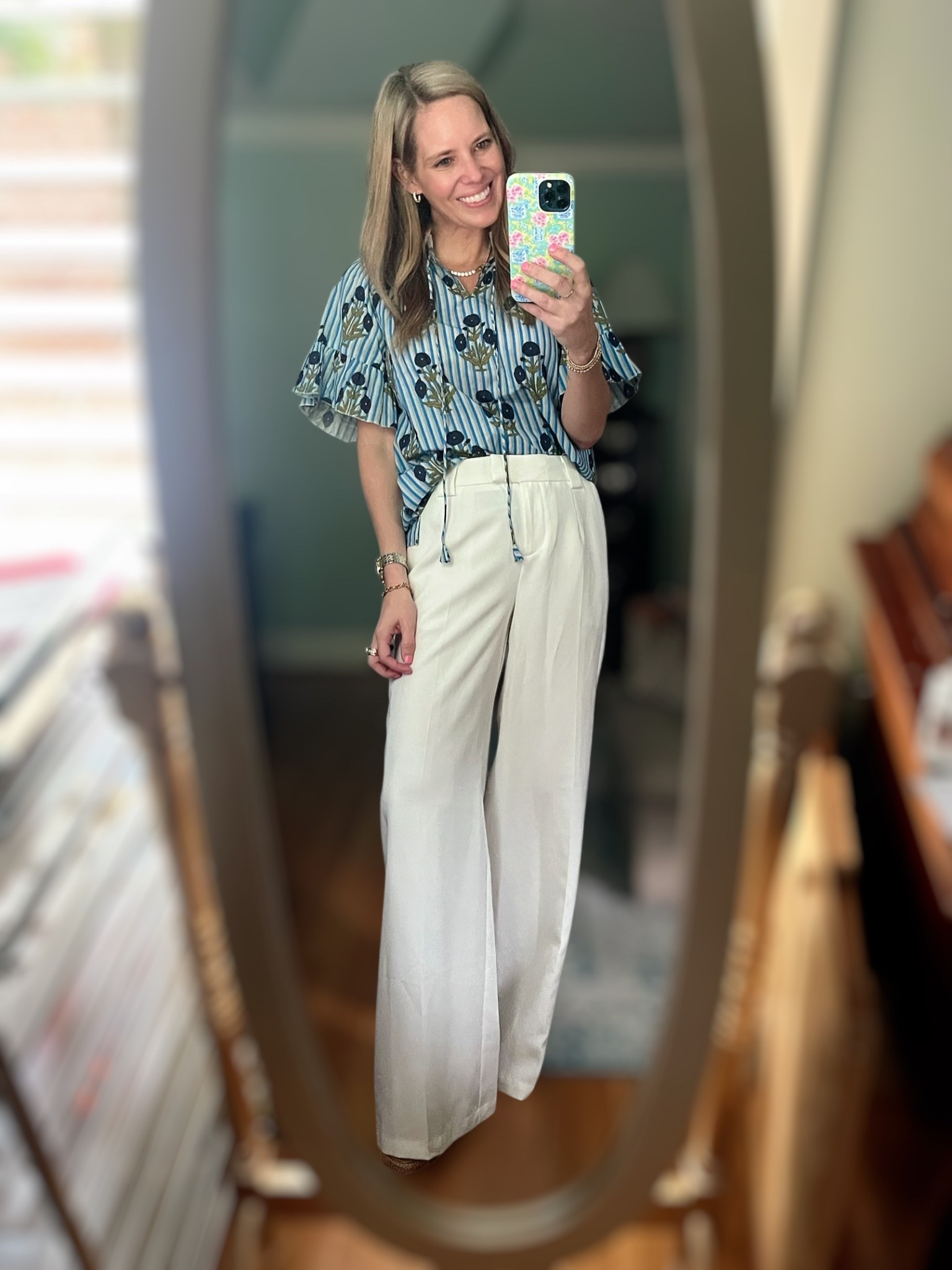 💙 Summer stripes done right! I’m wearing The Bell Top in Blue Stripe from @layerzclothing and it’s giving all the coastal chic vibes 🌊🌼 I styled it with wide leg ivory trousers and my go-to espadrille wedges for a polished, effortless look. This top features a bold floral block print, sweet ruffle sleeves, and the perfect lightweight fabric for sunny days ahead ☀️

📏 Wearing size XS in the top (it runs relaxed!)
👖 These high-waisted white pants are flowy, flattering, and perfect with sandals or wedges
👡 Shoes are espadrille wedges—an absolute summer staple!

🛍️ This look is perfect for brunch, showers, or summer events!
💥 Use code PREPPYREBEL for 10% off Melinda Maria jewelry to complete the look with layered gold glam ✨

#layerzclothing #ohmystars #ohmystarsapparel #summerstyle #coastaloutfit #espadrillelove #ruffletop #classicstyle #preppychic #ltkstyle #ltkfashion #ltkunder100


#LTKFindsUnder50 #LTKOver40 #LTKFindsUnder100
