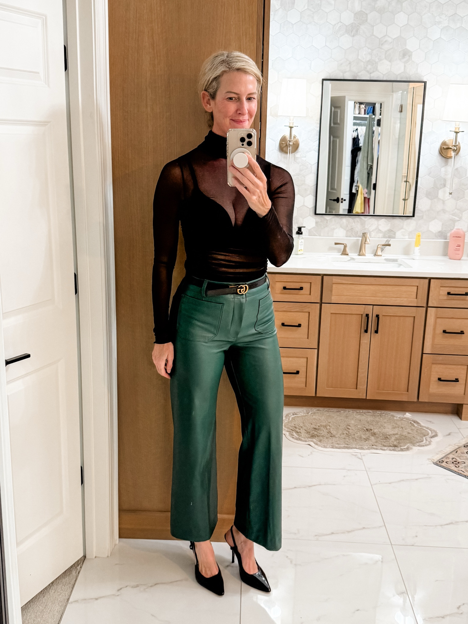 Love this sheer bodysuit I found on Amazon…love that you can make it sexy or more casual based on the bra you wear…paired with these green leather pants it’s so good for a GNO or date night ❤️

Wearing a Small in bodysuit 
Wearing a 27 in pants 

#LTKStyleTip #LTKTall #LTKOver40