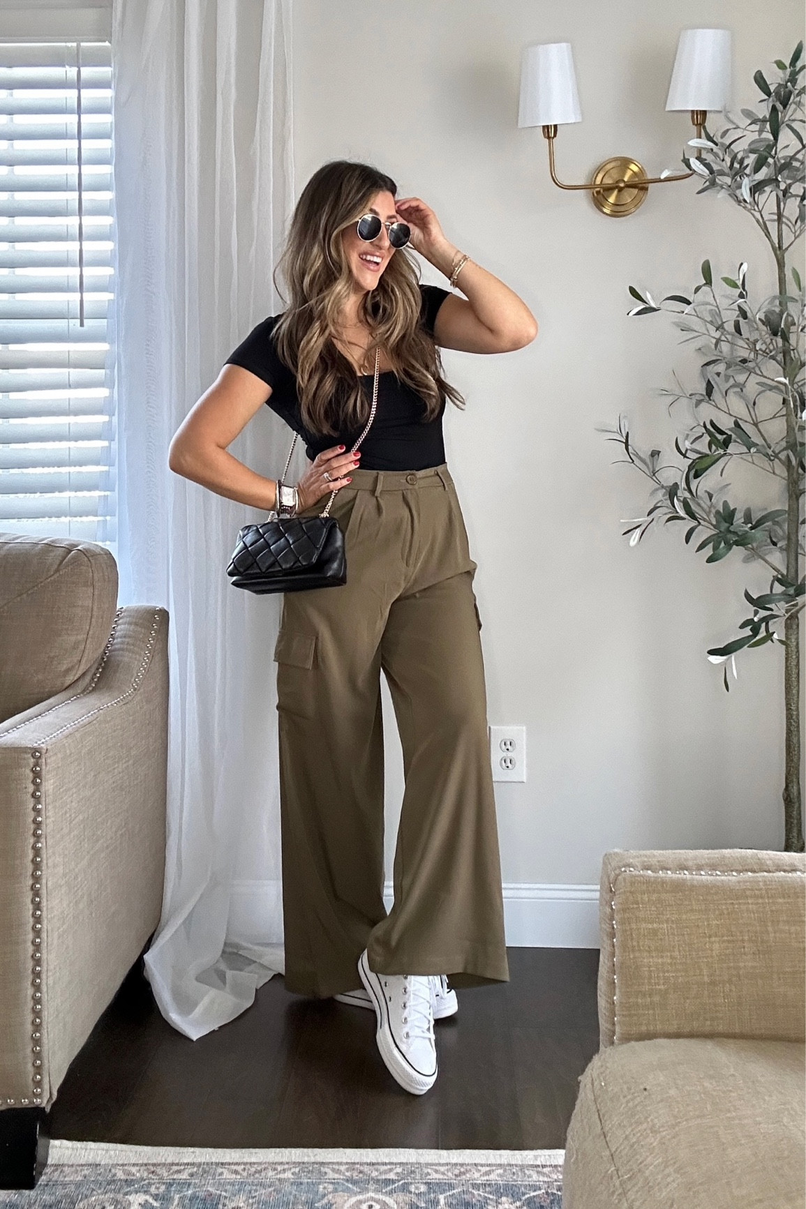 Fitted Amazon top and hunter green cargos pants. 🤌🏼 wearing meds. 

Spring outfit, casual outfit. 

Tap photos to shop and follow for more! Xx

#LTKstyletip #LTKSeasonal #LTKitbag