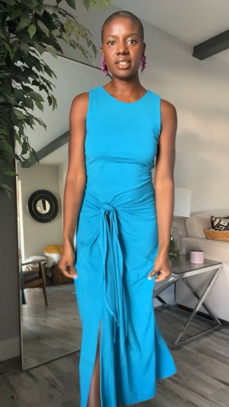 Blue Sleeveless tank dress with slit and front tie. I’m wearing a small. Runs true to size  Comes in black too! 

#LTKVideo #LTKworkwear #LTKfindsunder50