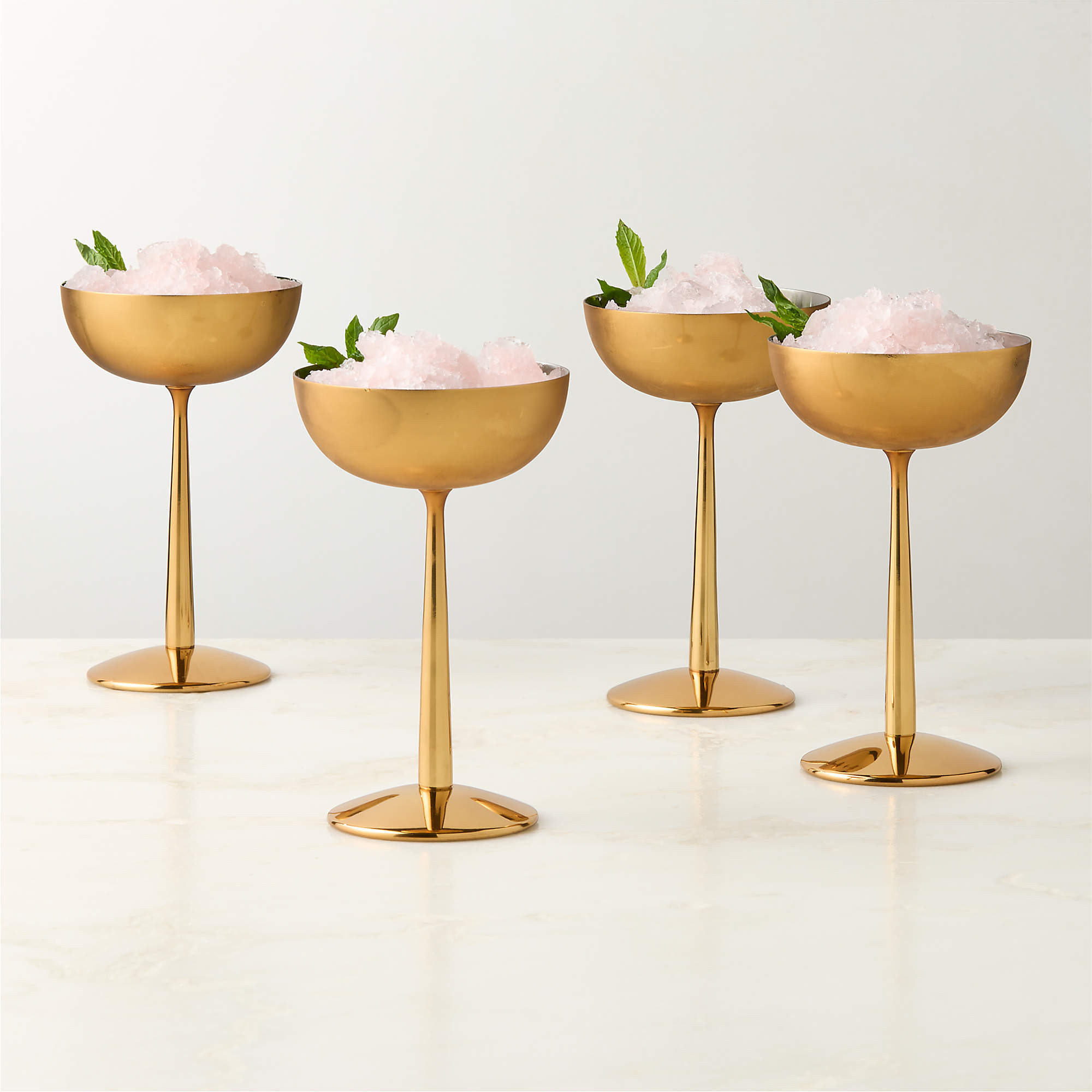 Emporia Brass-Plated Coupe Glasses Set of 4 + Reviews | CB2 | CB2