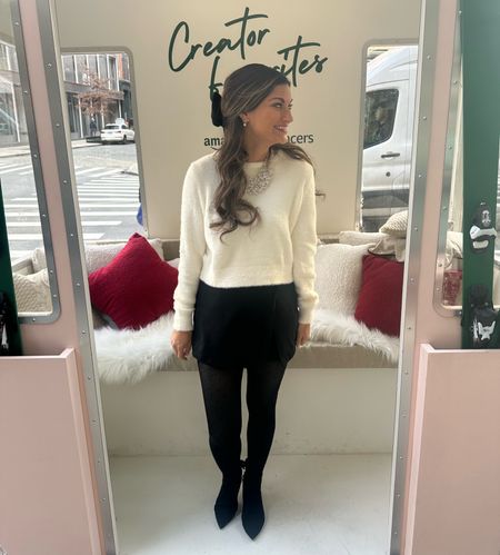 Adorable winter outfit with a cream sweater and black skirt 

#LTKfindsunder50 #LTKstyletip #LTKSeasonal