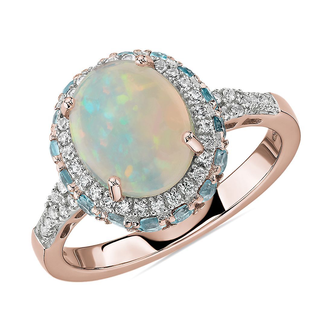 Oval Opal and Swiss Blue Topaz Halo Ring in 14k Rose Gold | Blue Nile | Blue Nile