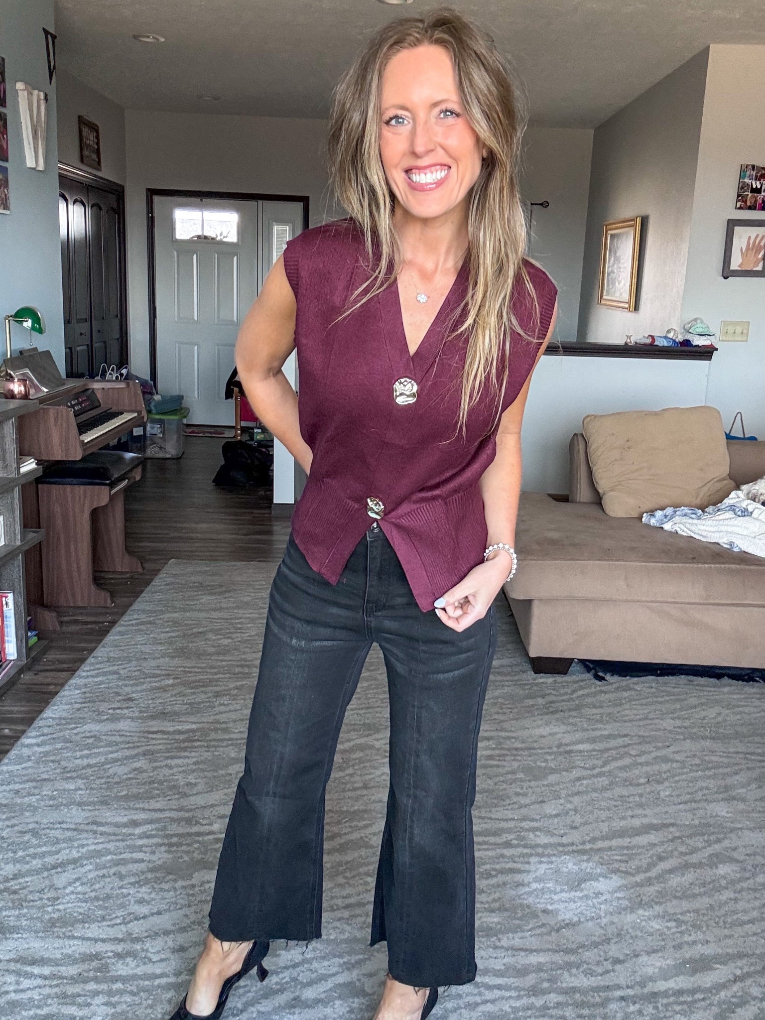 This burgundy sleeveless sweater is beautiful! 🙌🏻 Perfect for date night or the office! Wearing a small.

As an Amazon Influencer I earn commission on qualifying purchases.

Burgundy top, mom style, spring fashion 2026, office attire, black denim, black heels

#LTKOver40 #LTKWorkwear #LTKMidsize