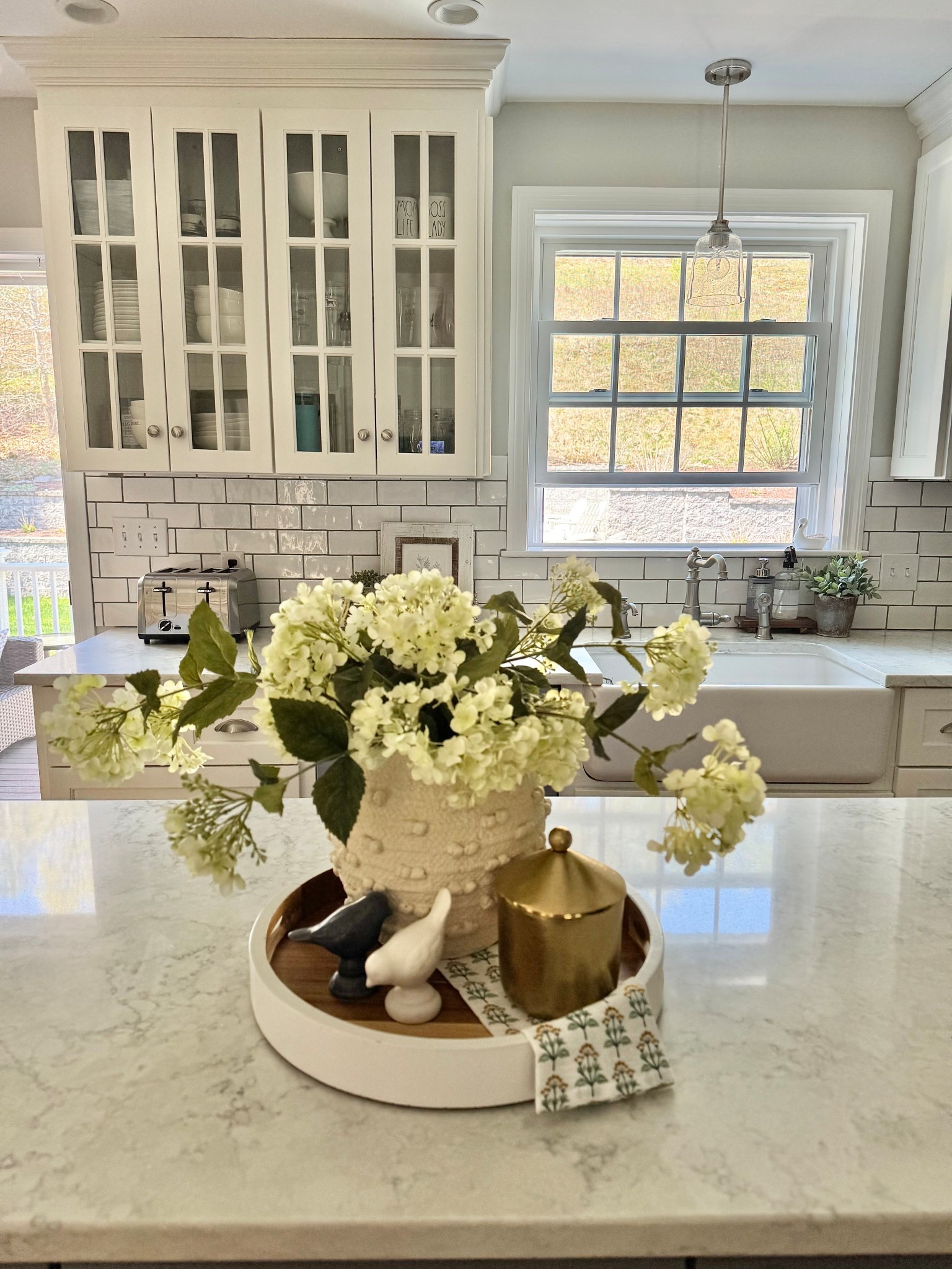 Snowball hydrangeas are so beautiful and these faux ones don’t disappoint! Realistic greenery, stems and flower make these a must have this season. 

Vases | spring decor | summer home styling | kitchen styling | tray styling | kitchen decor | kitchen remodel | farmhouse kitchen | white kitchen

#LTKHome #LTKSeasonal